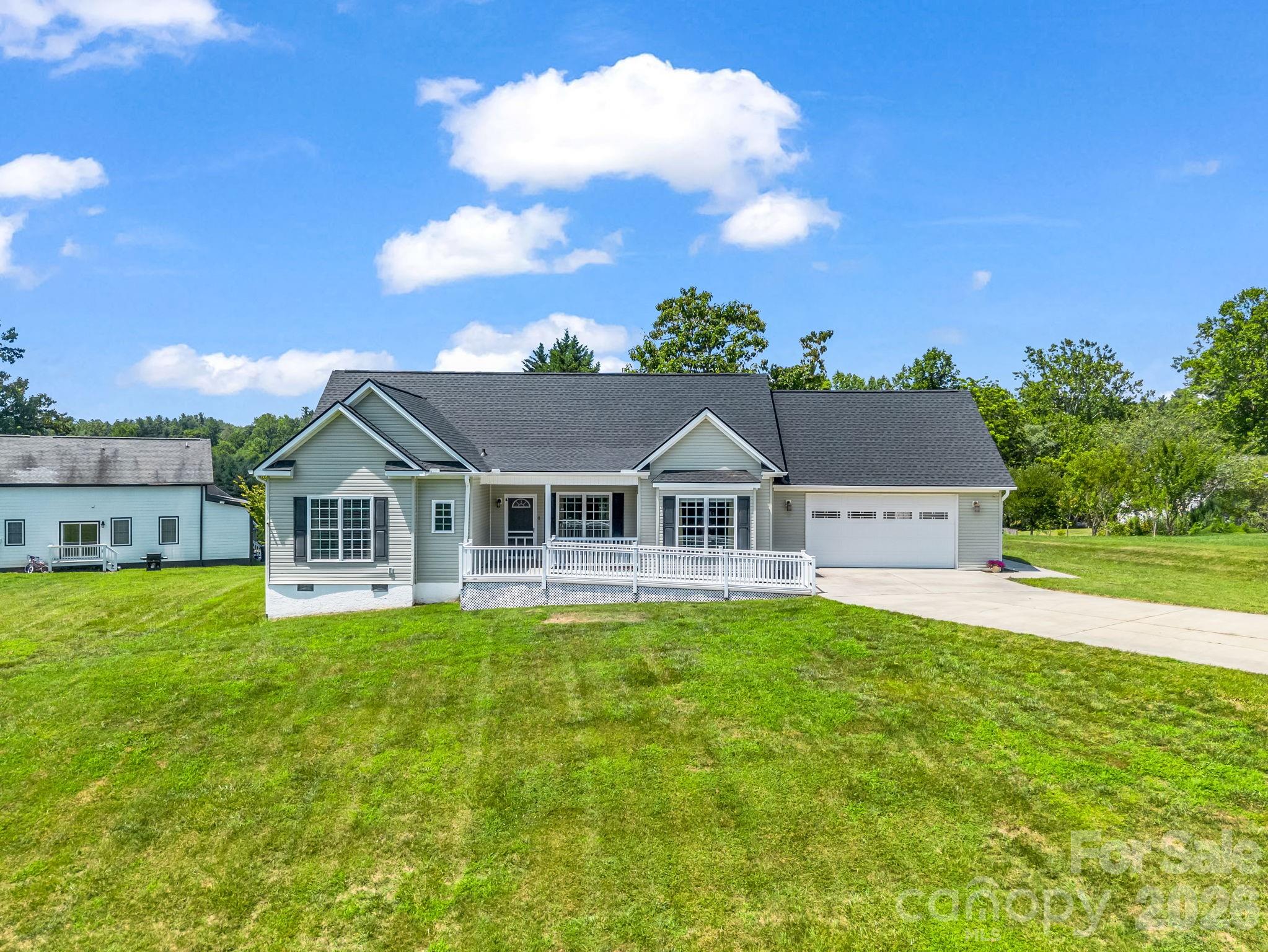Welcome to 355 Hidden Meadow Drive, situated near the end of a quiet cul-de-sac on 0.45 acres. - 355 Hidden Meadow Drive, Hendersonville