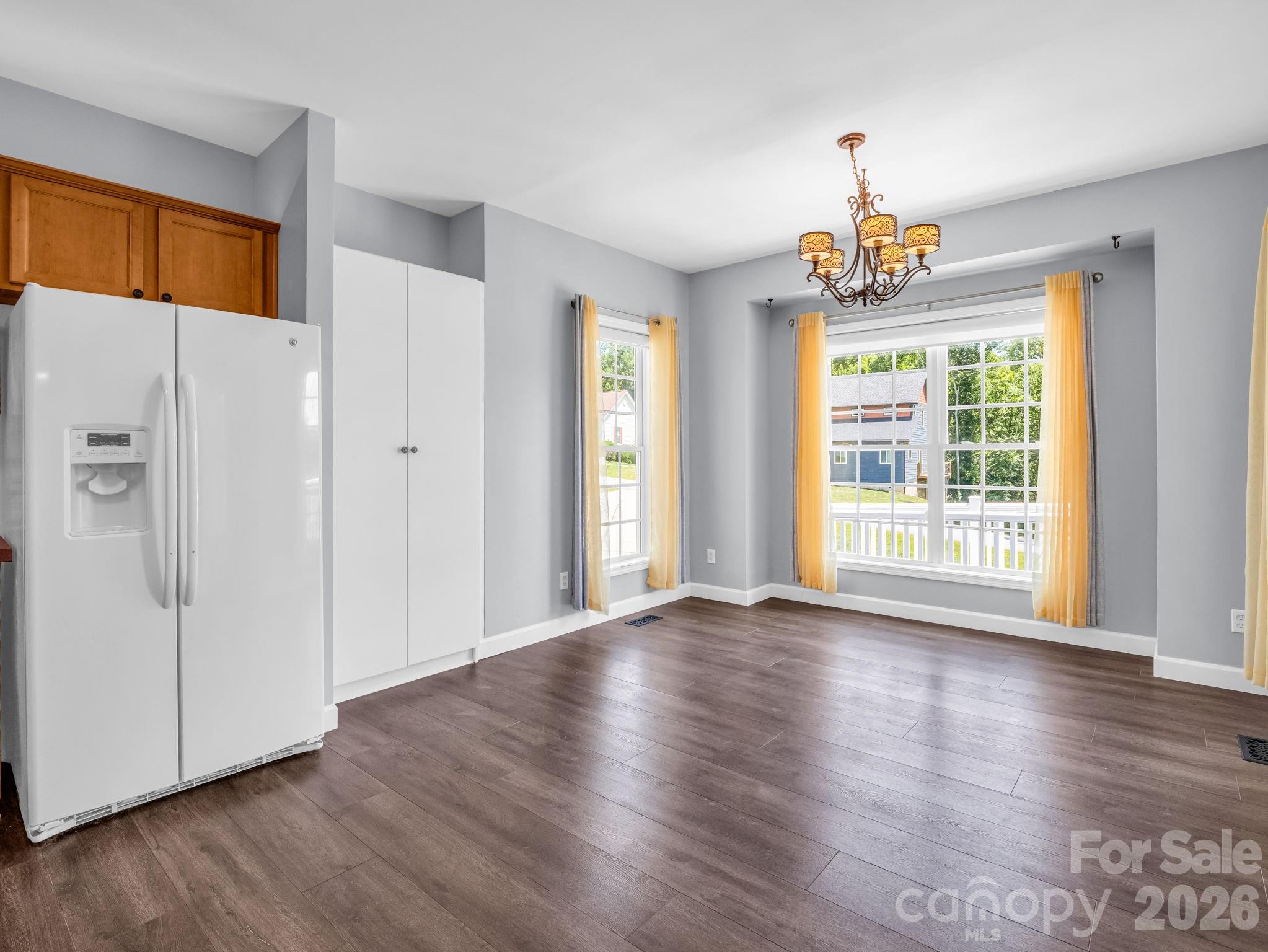 Once you enter the kitchen you will see a light-filled dedicated dining area with, pantry. - 355 Hidden Meadow Drive, Hendersonville