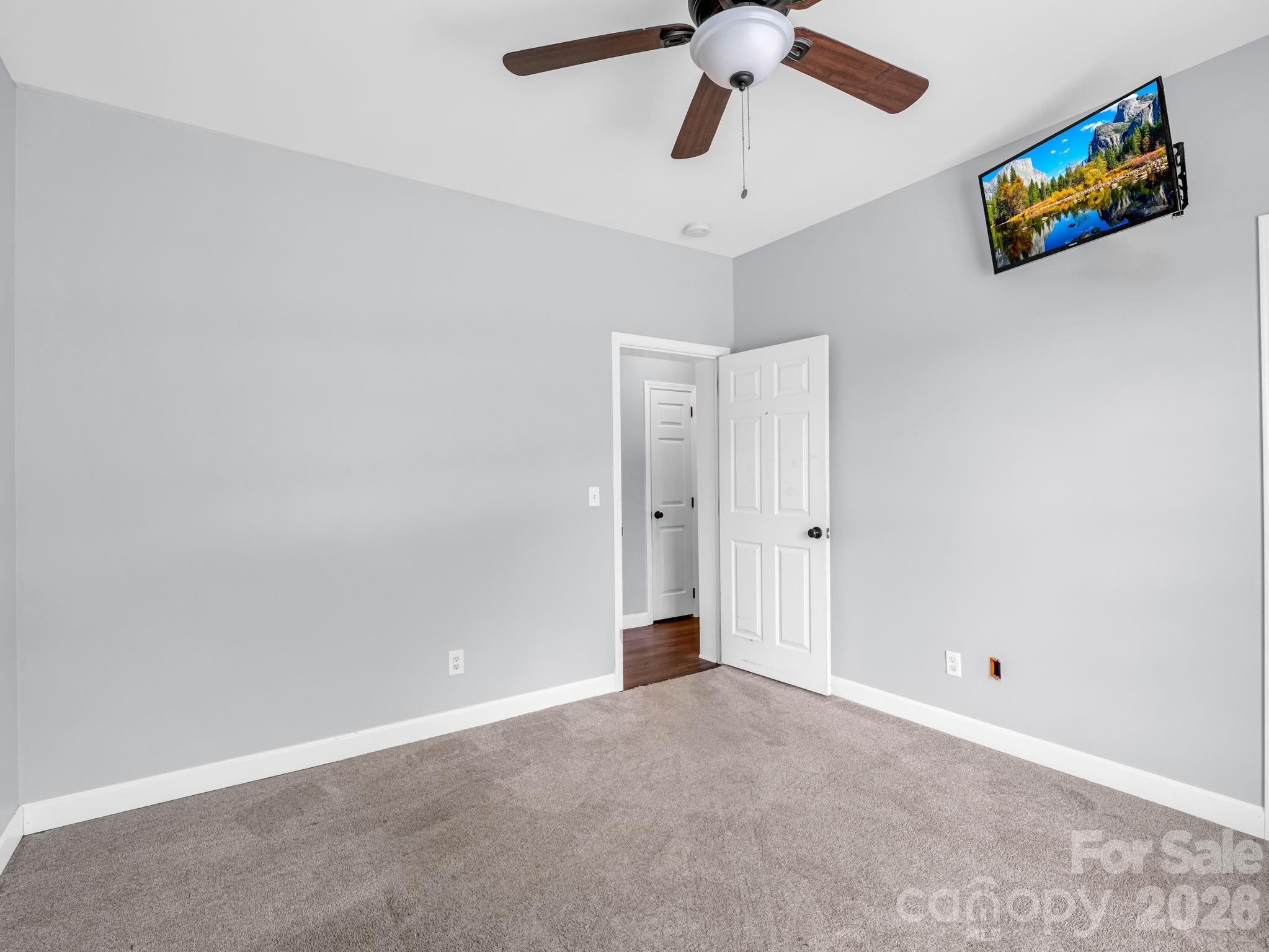 Bedroom # 1 looking from corner of room to door. - 355 Hidden Meadow Drive, Hendersonville