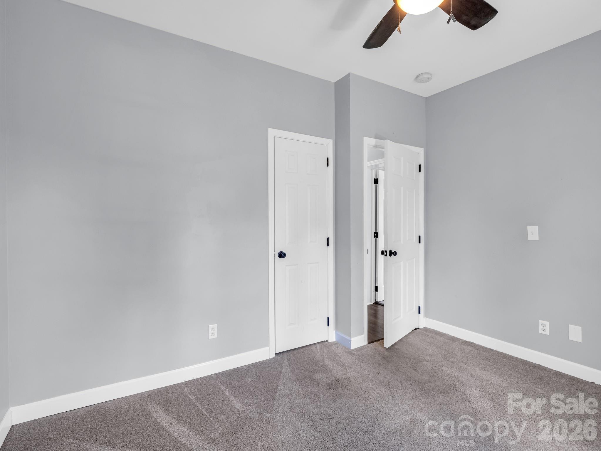 Office / flex space view looking at door w/ small closet. - 355 Hidden Meadow Drive, Hendersonville