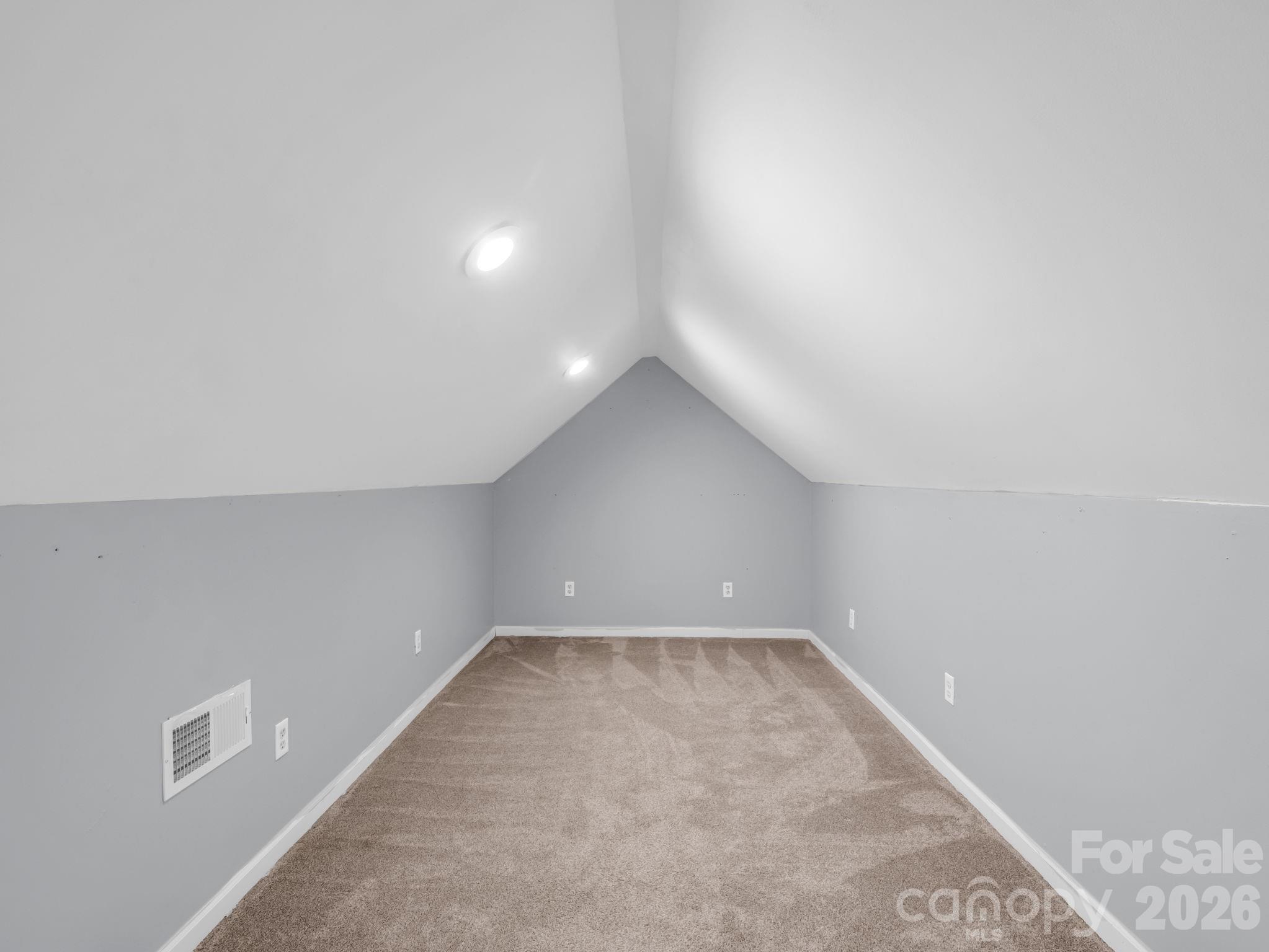 Bedroom # 3 has a huge walk-in closet; sellers remove a custom closet solution for this room and it can be found in the room above the garage. Could easily be put back in if buyer desires. - 355 Hidden Meadow Drive, Hendersonville