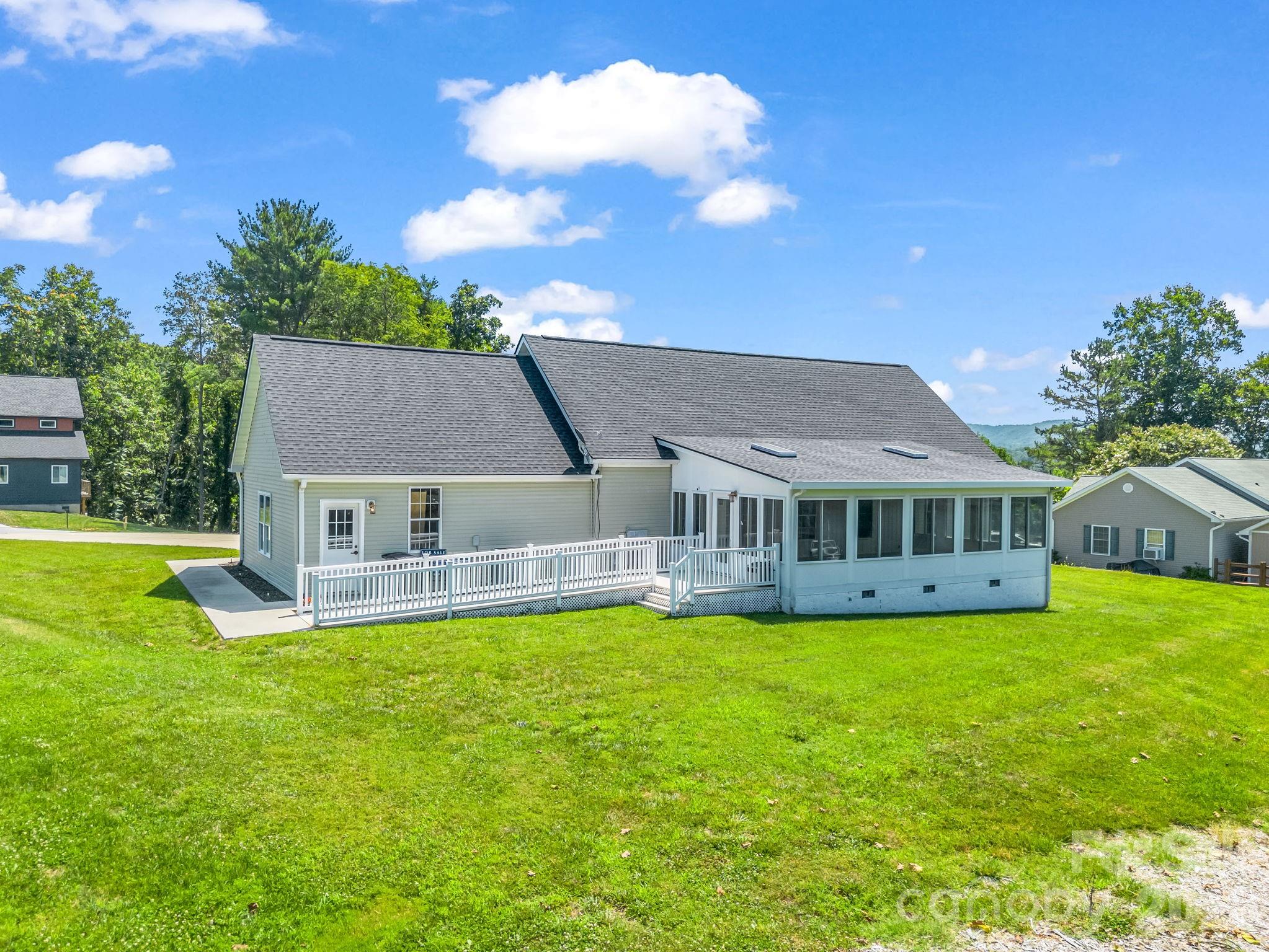 View from corner of lot to the back of the home. - 355 Hidden Meadow Drive, Hendersonville