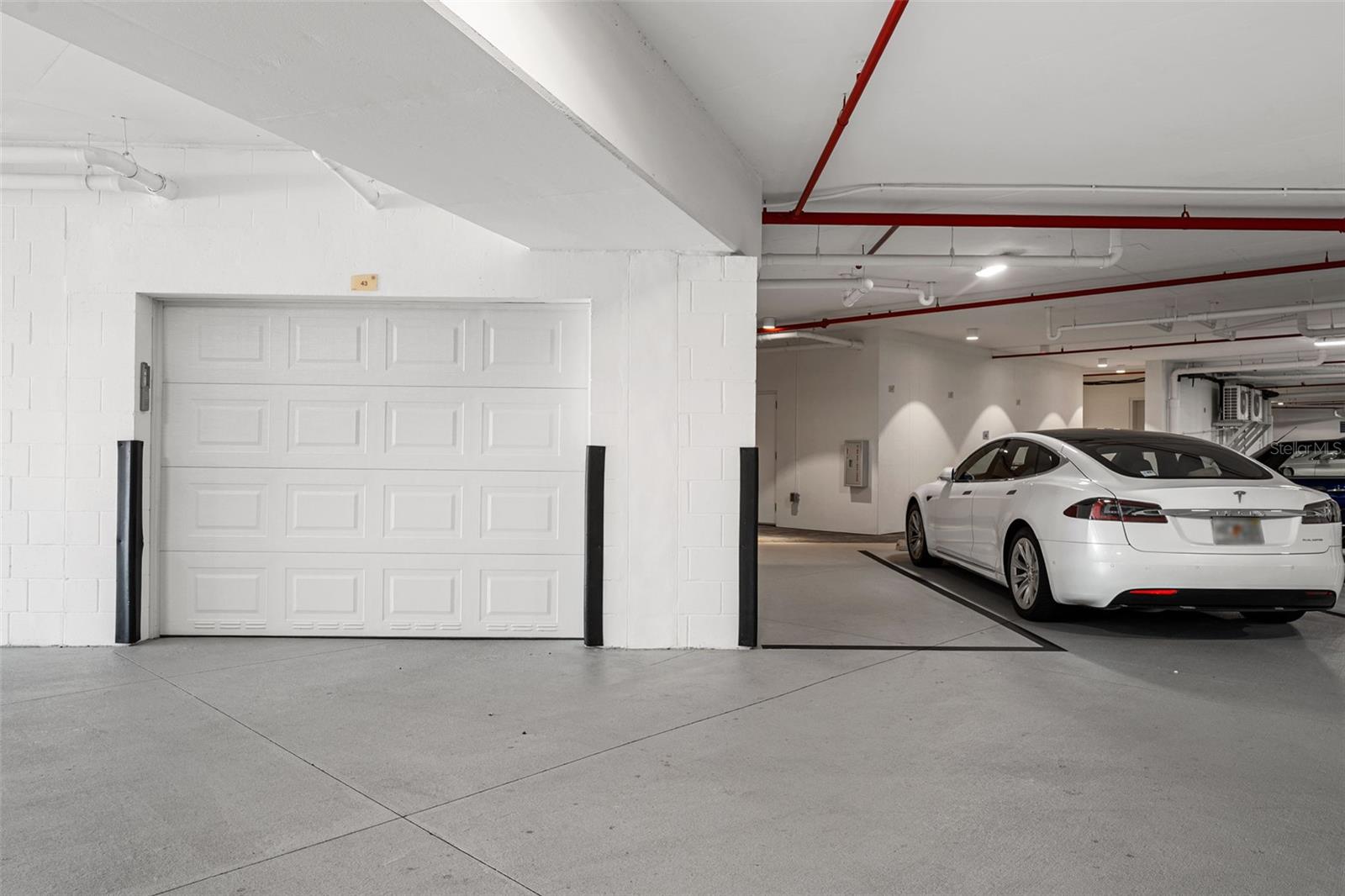 Private garage and assigned parking space - 795 COLLANY RD #204, TIERRA VERDE