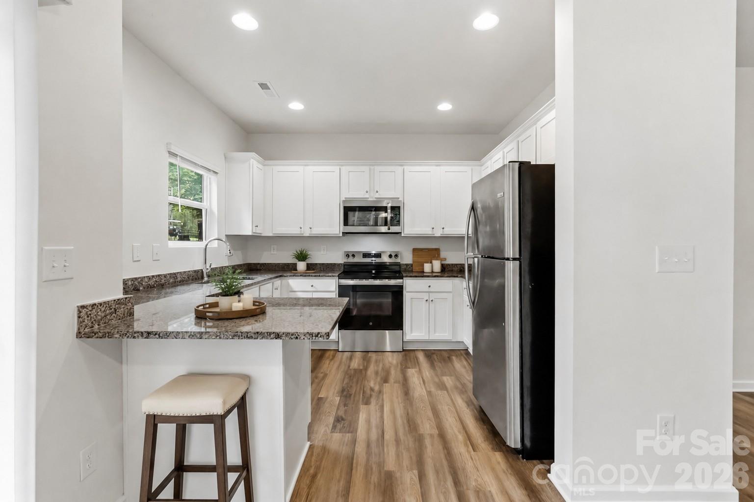 Virtually Staged Kitchen with Granite Counters - 720 White Crane Road, Salisbury