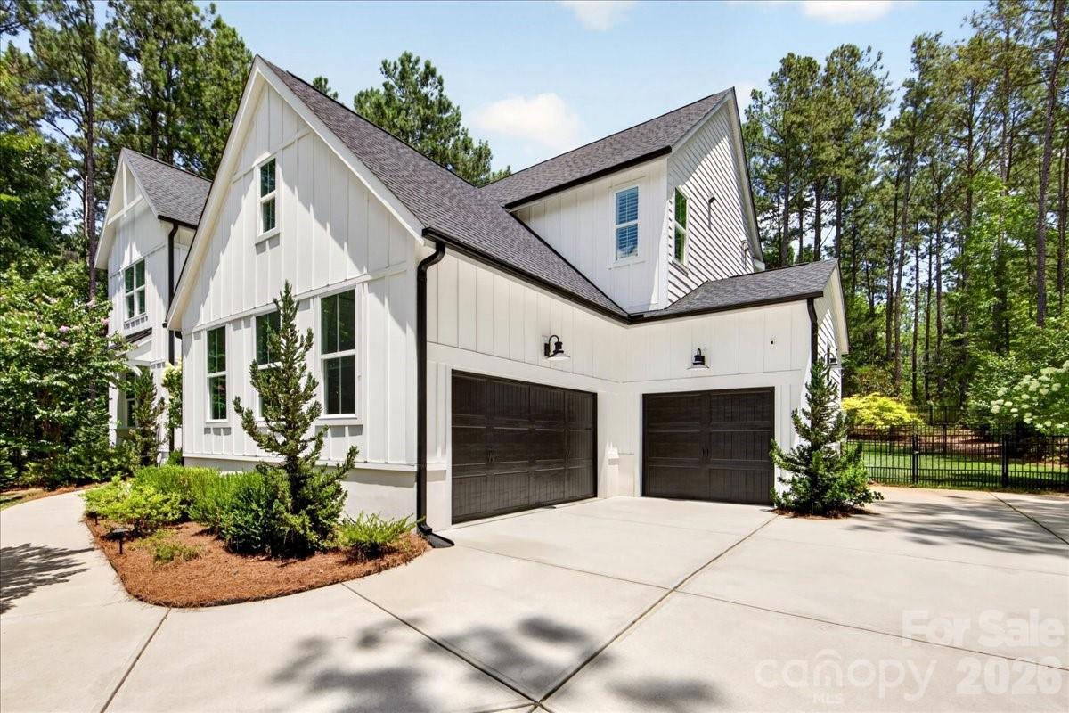 3 car garage and extended concrete for lots of parking/turnaround- there is a smaller fenced area between the driveway and fenced back yard area for pet area - 3142 Sherman Drive, Lancaster