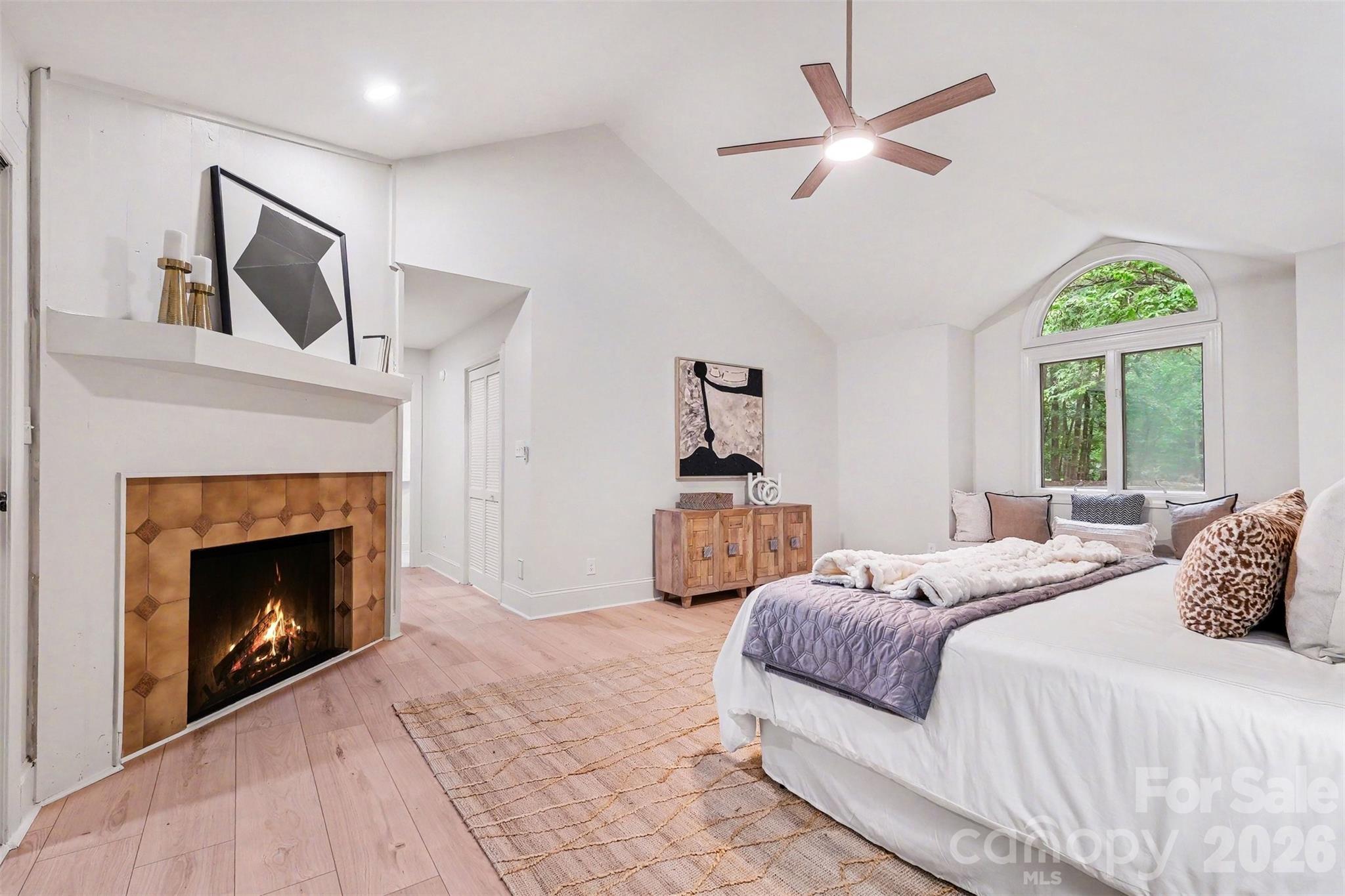 Yes, your new owners' bedroom on the MAIN has a wood-burning fireplace. - 5042 Marci Lane, Belmont