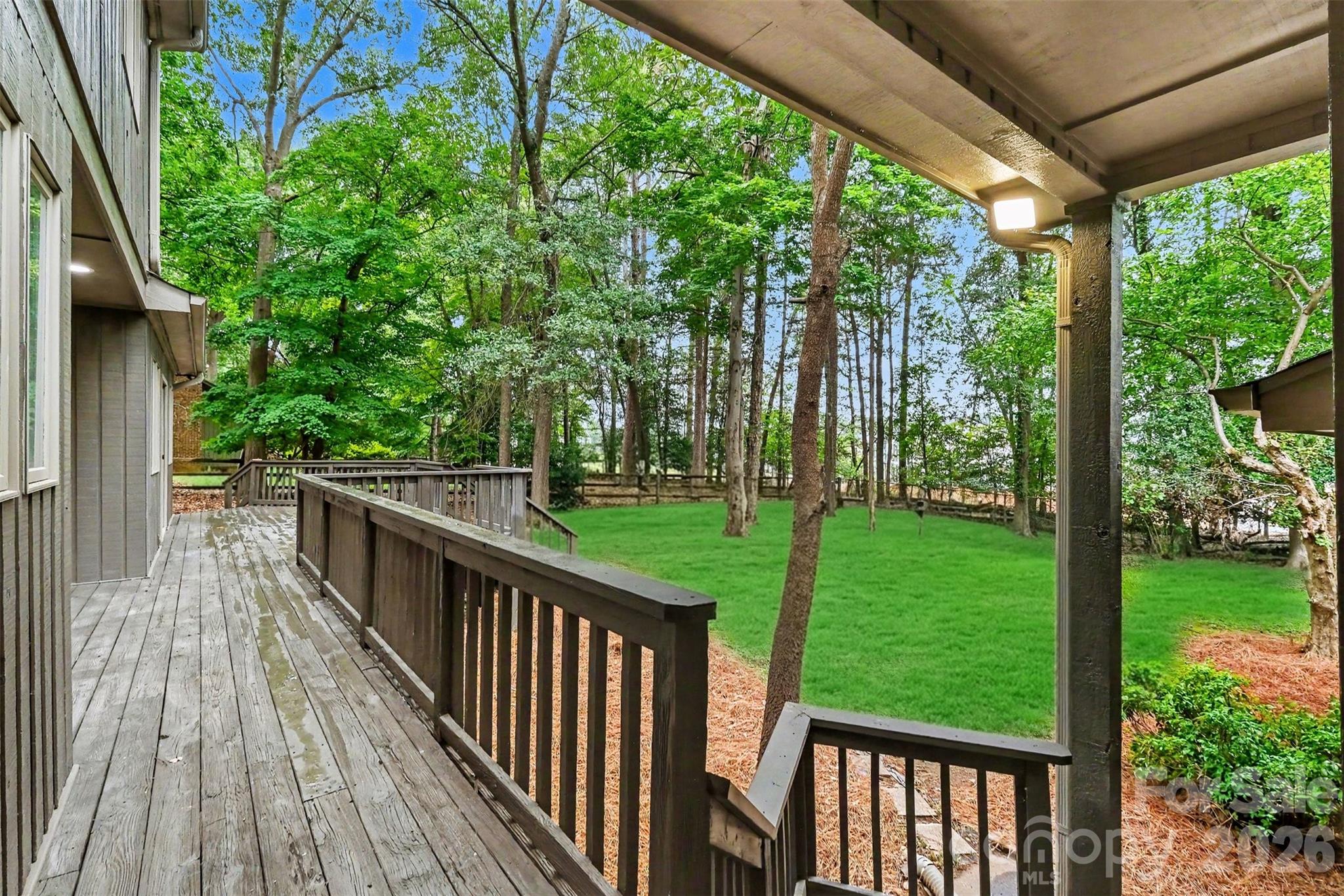 Your new deck overlooks a large, private backyard. - 5042 Marci Lane, Belmont
