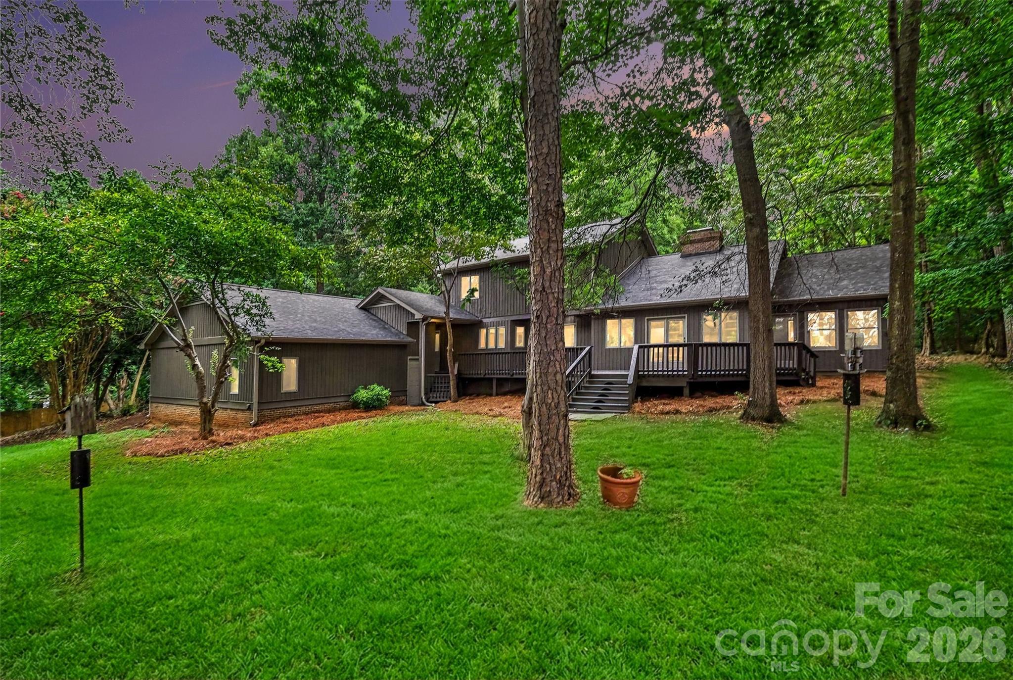 A view of your new backyard space from the back fence. - 5042 Marci Lane, Belmont
