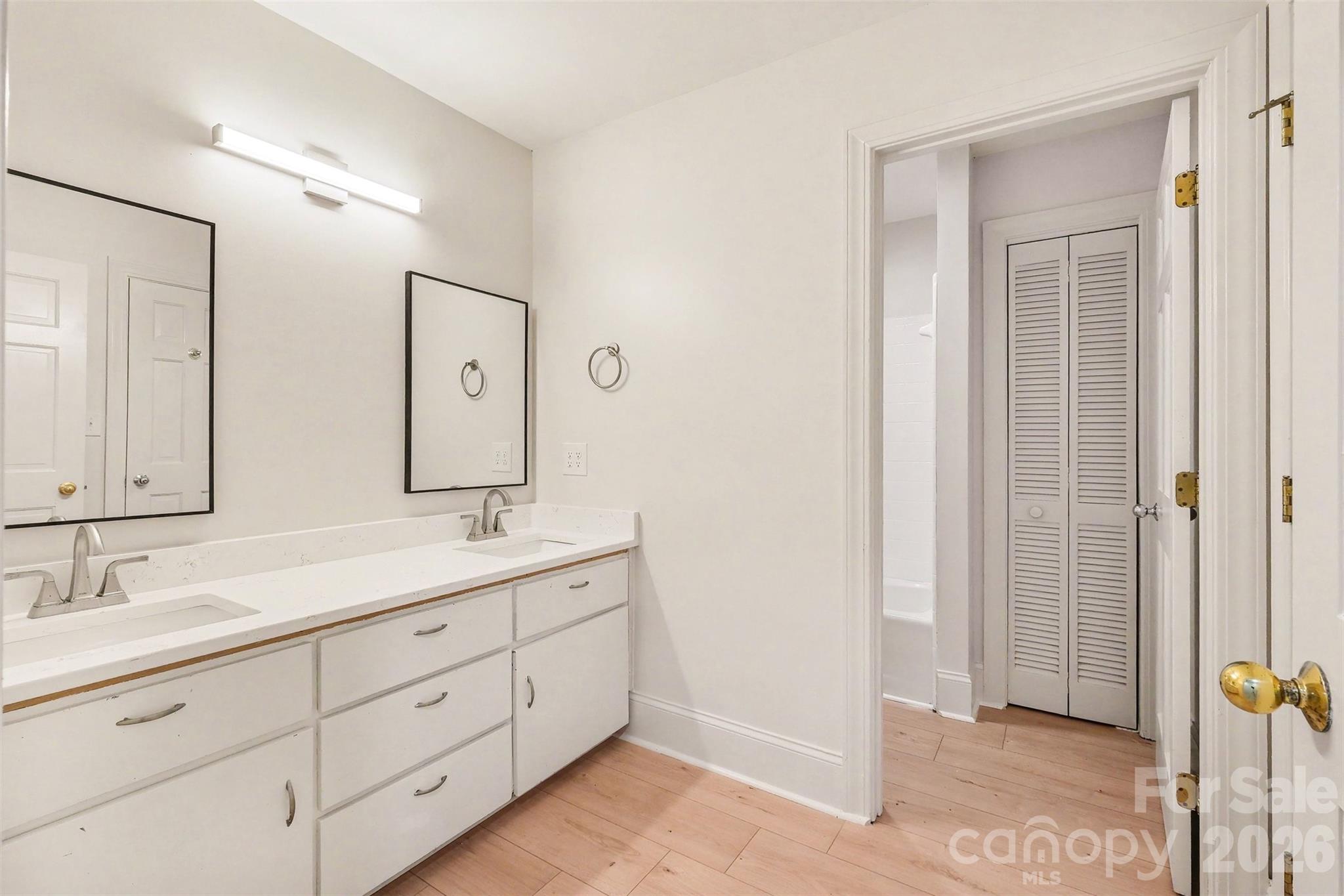 Your new guest bathroom on the upper level with a new double-vanity ... - 5042 Marci Lane, Belmont