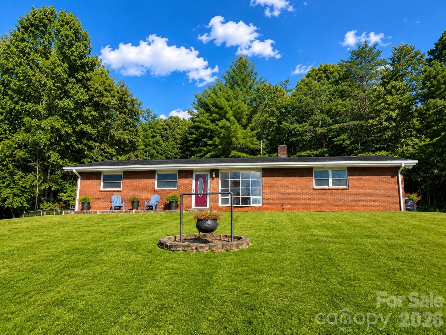 Single Family Residence at 651 Case Cove Road, Candler, photo 2 of 47