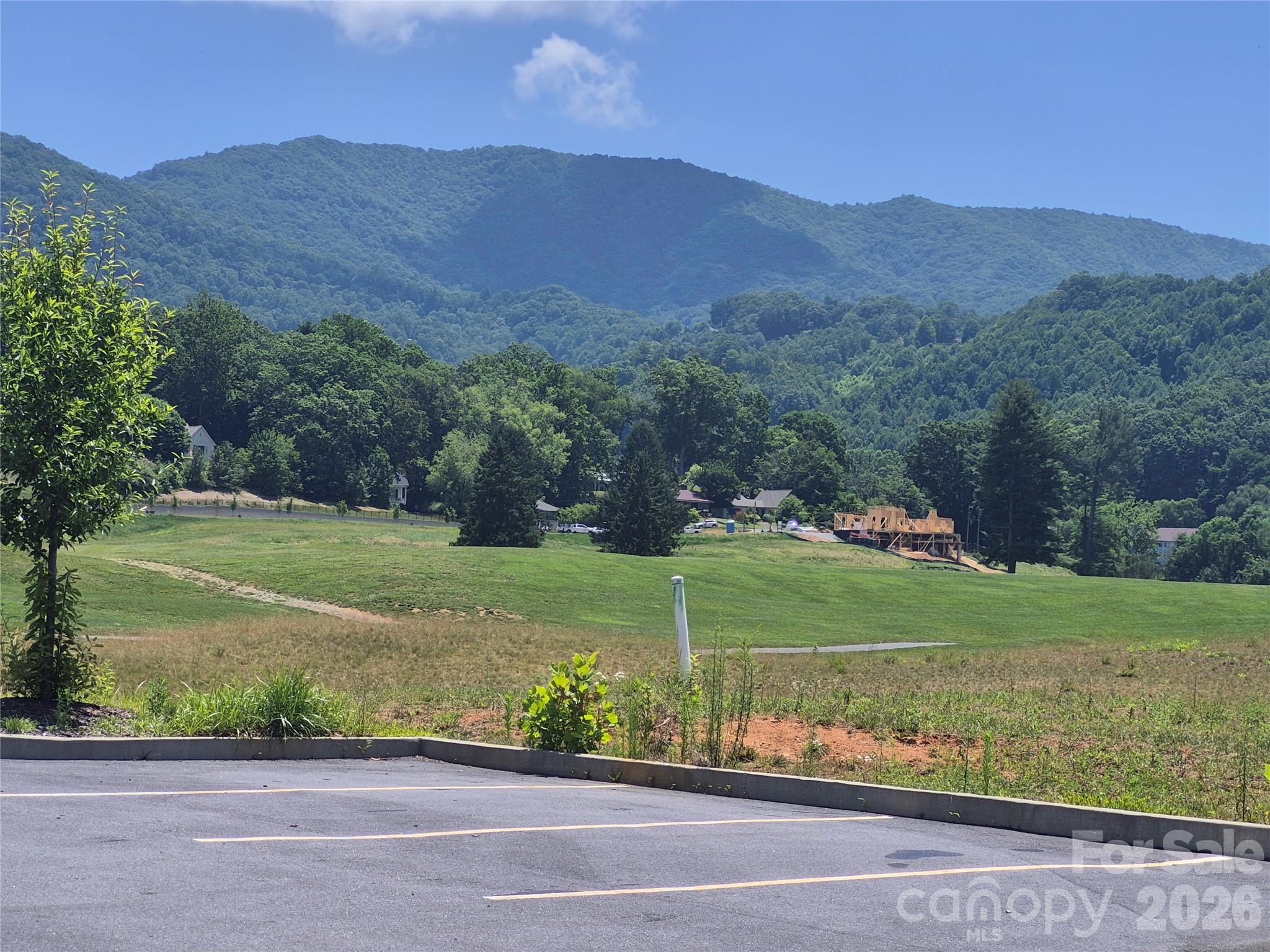 View of lot from 9th green area - 30 Farmer Branch Lane, Waynesville