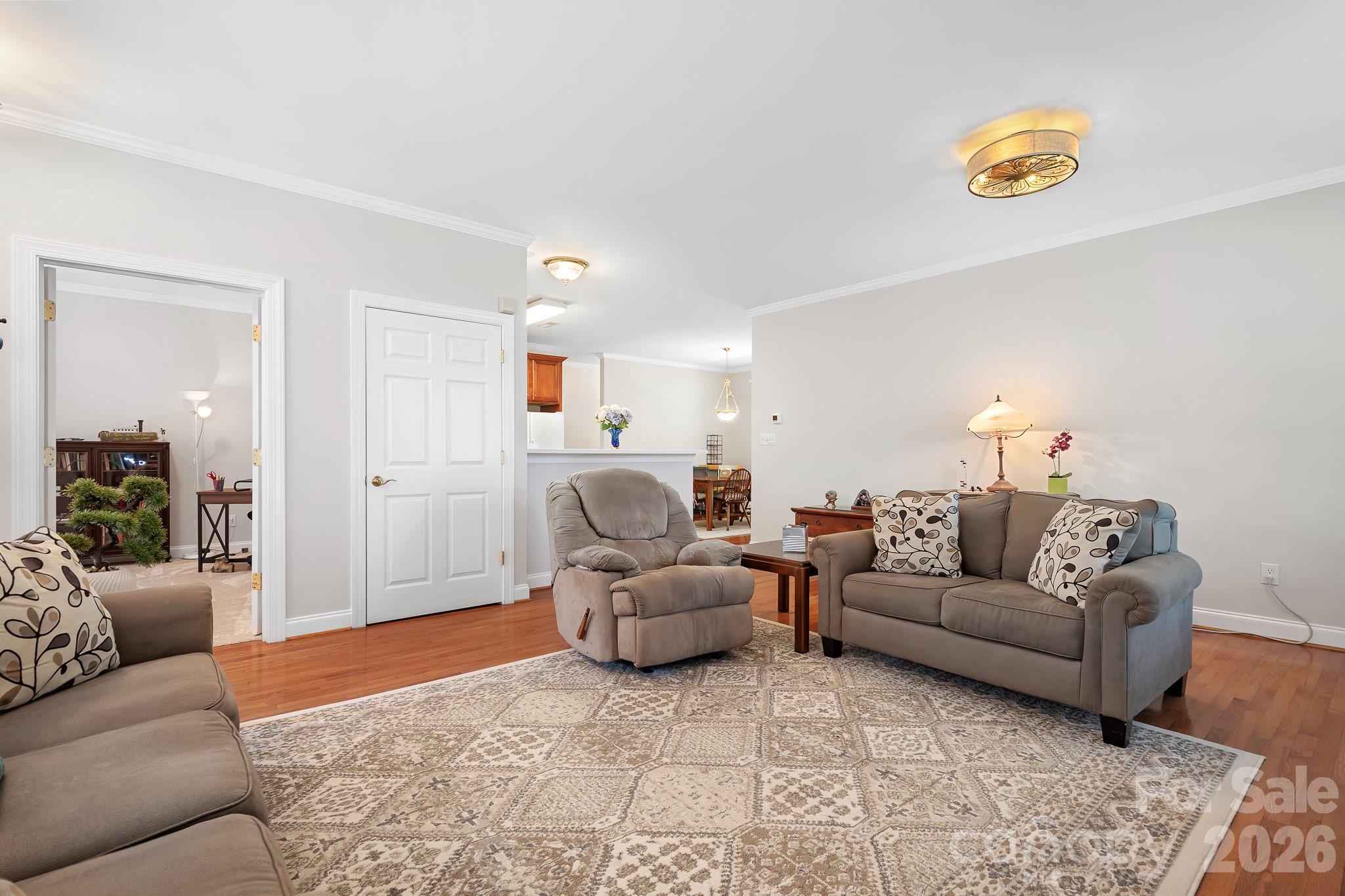 Living room opens to kitchen - 215 Knops Nob Road, Mooresville