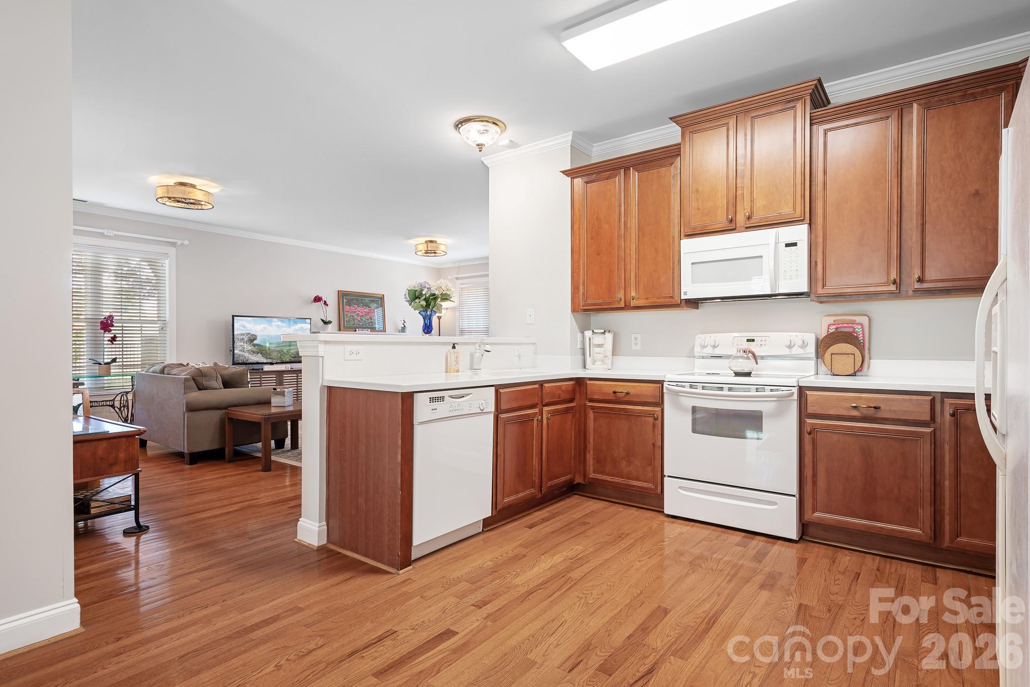 Kitchen is open to living room and dining area - 215 Knops Nob Road, Mooresville