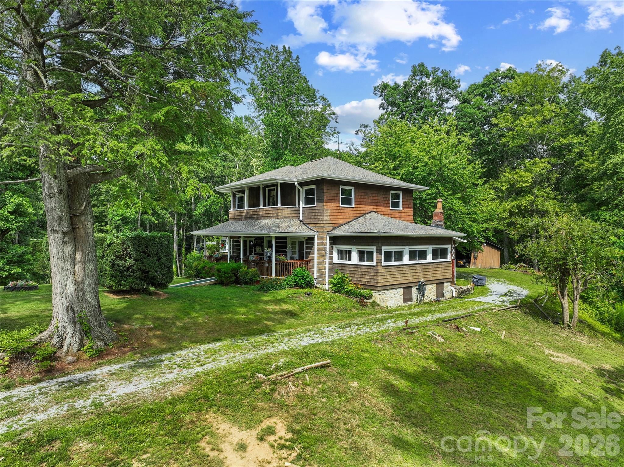 Side view of home - 3151 N Bearwallow Road, Hendersonville