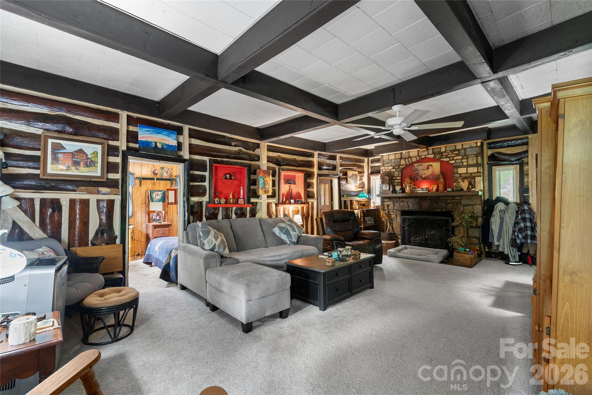 Living room w/log cabin walls - 3151 N Bearwallow Road, Hendersonville