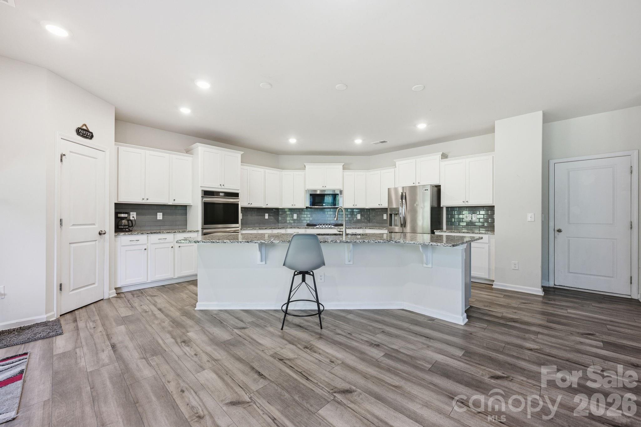 Kitchen with Walk-In Corner Pantry - 328 Kennerly Center Drive, Mooresville