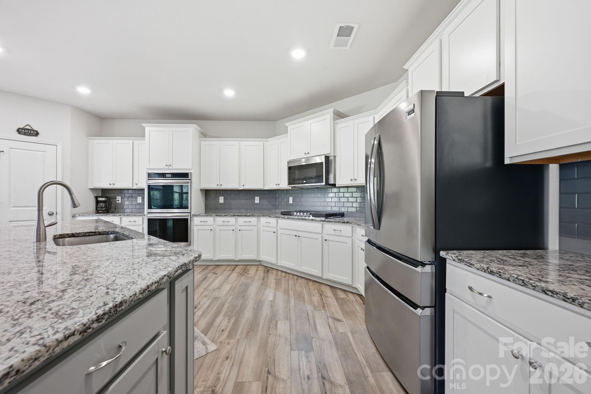 Kitchen with Stainless Appliances - 328 Kennerly Center Drive, Mooresville