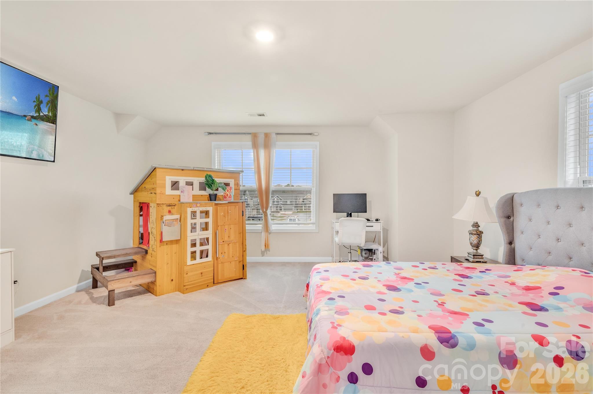 This sprawling secondary bedroom has generous square footage for flexible layout options. Could be used as a second primary suite or a bonus room. - 4849 Tacoma Drive, Fort Mill