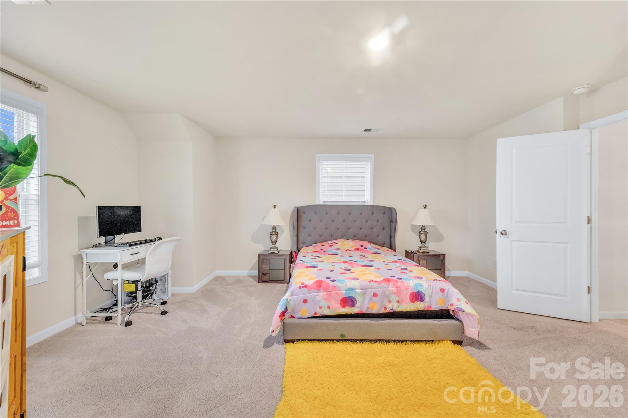 This versatile oversized bedroom could be used as a spacious teenage retreat, a large media/play room, oran expansive second suite - 4849 Tacoma Drive, Fort Mill