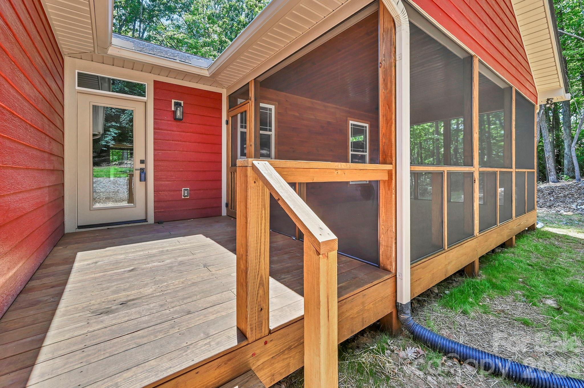 screened in porch off of kitchen - 63 Abbey Lane, Hendersonville