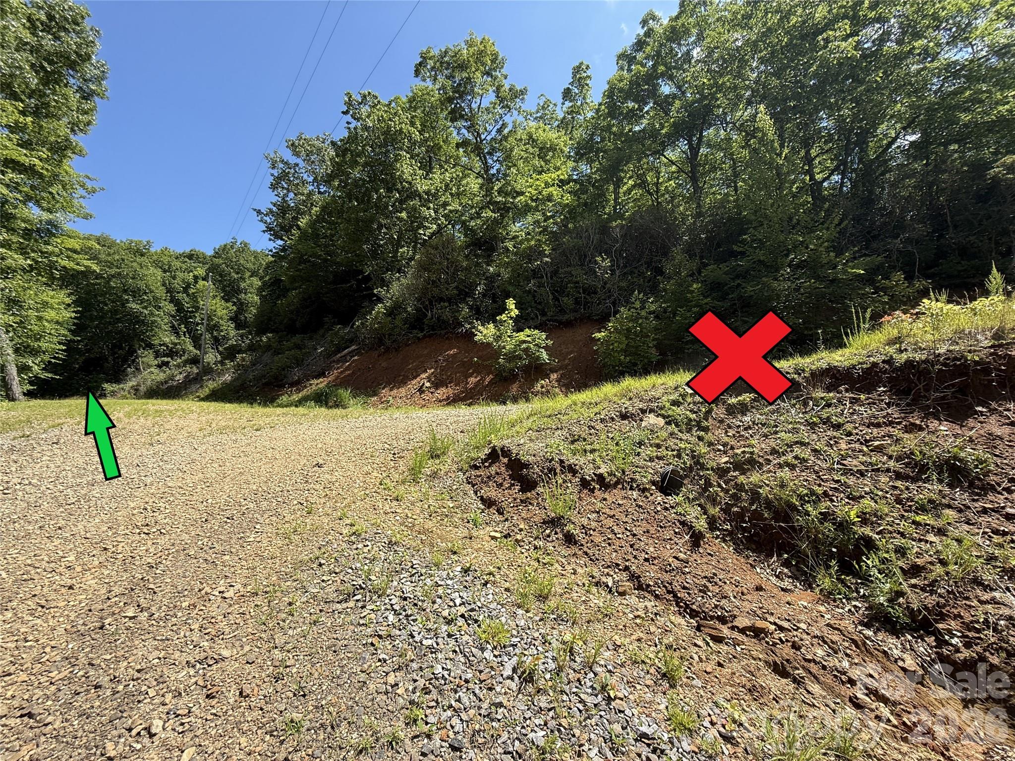 Access to property (go left here!) - 999 Hawks Nest Drive, Burnsville