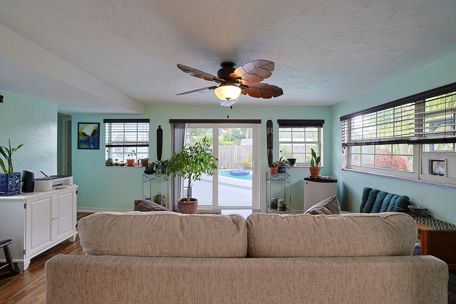 Florida Room into Backyard Pool Area - 2553 NORDMAN AVE, NEW SMYRNA BEACH