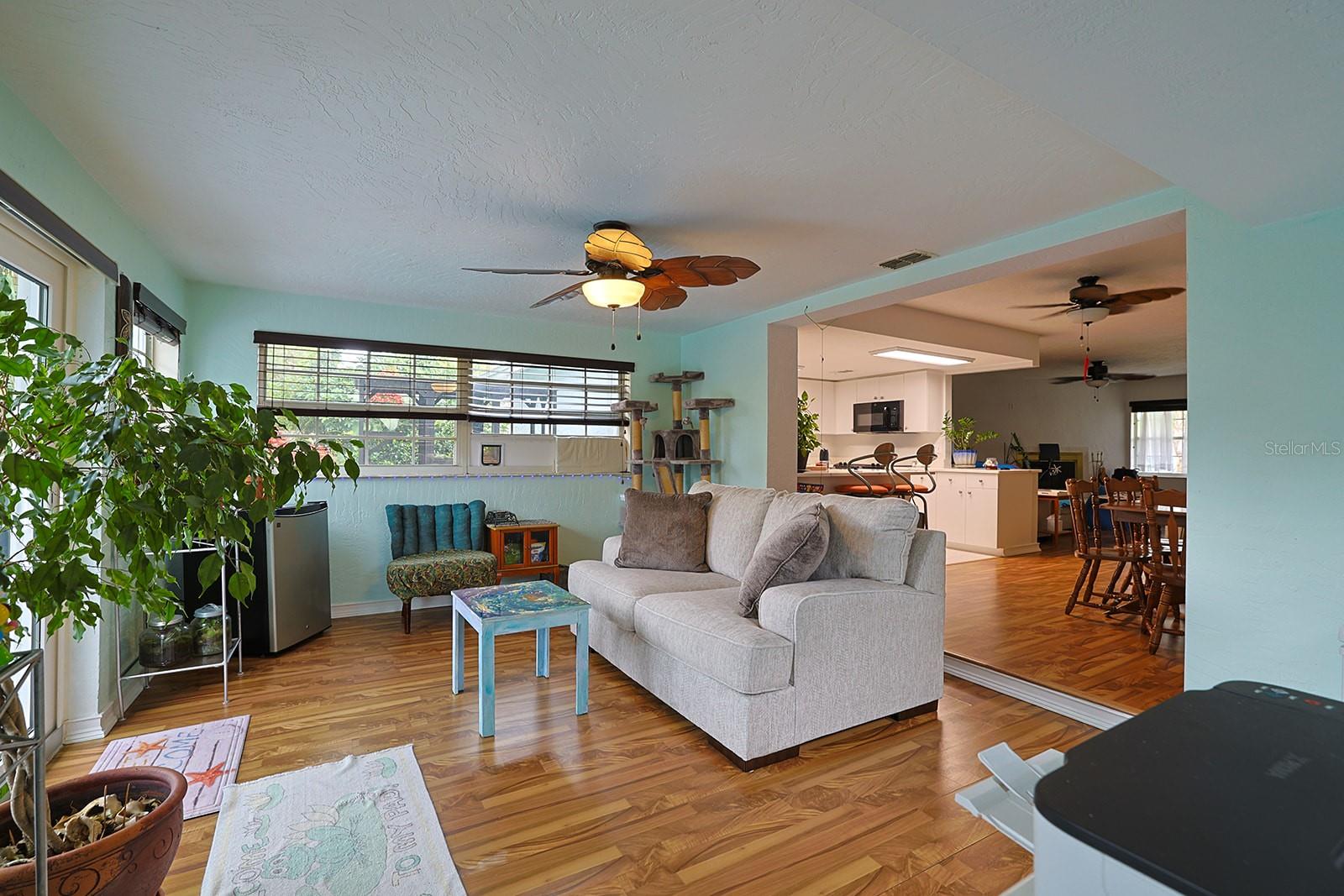 Dining Area into Florida Room - 2553 NORDMAN AVE, NEW SMYRNA BEACH