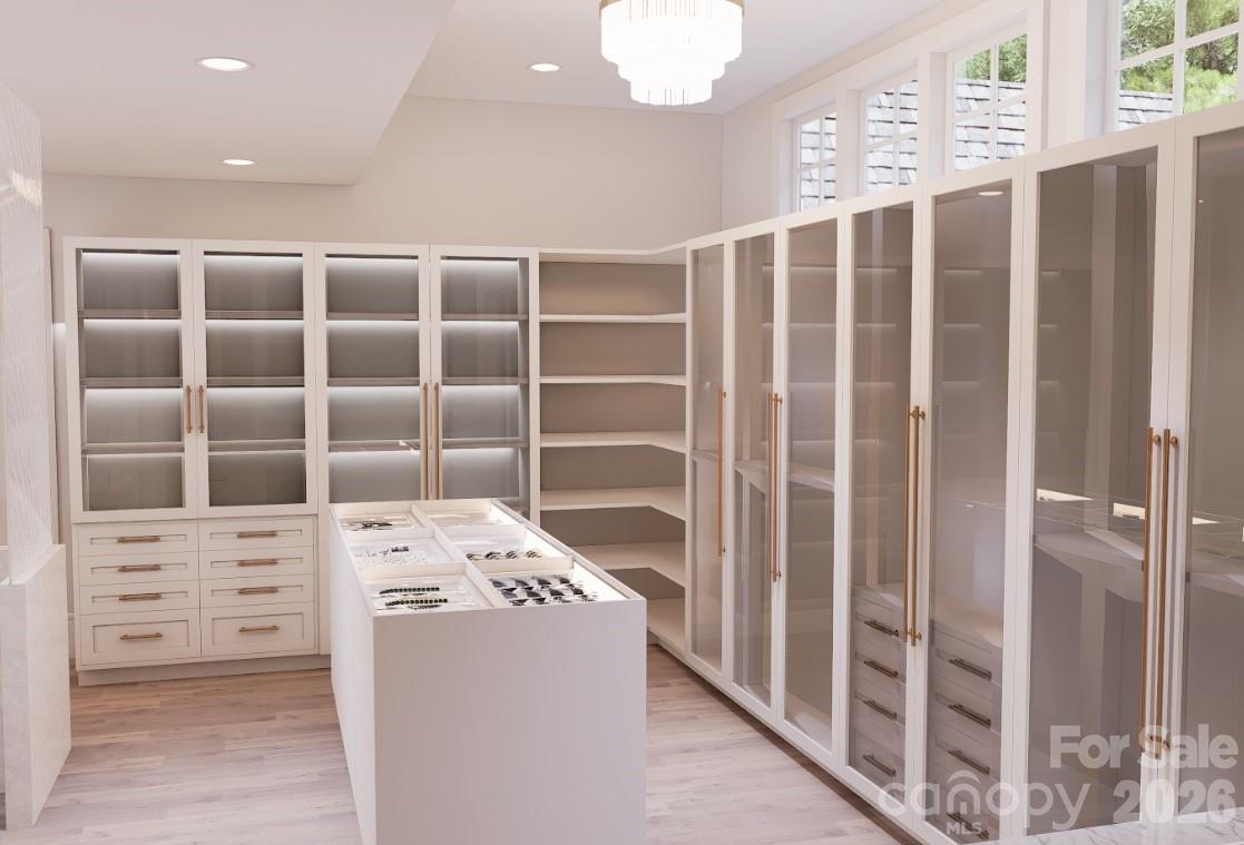 His side of closet - 104 Sherwood Drive, Huntersville