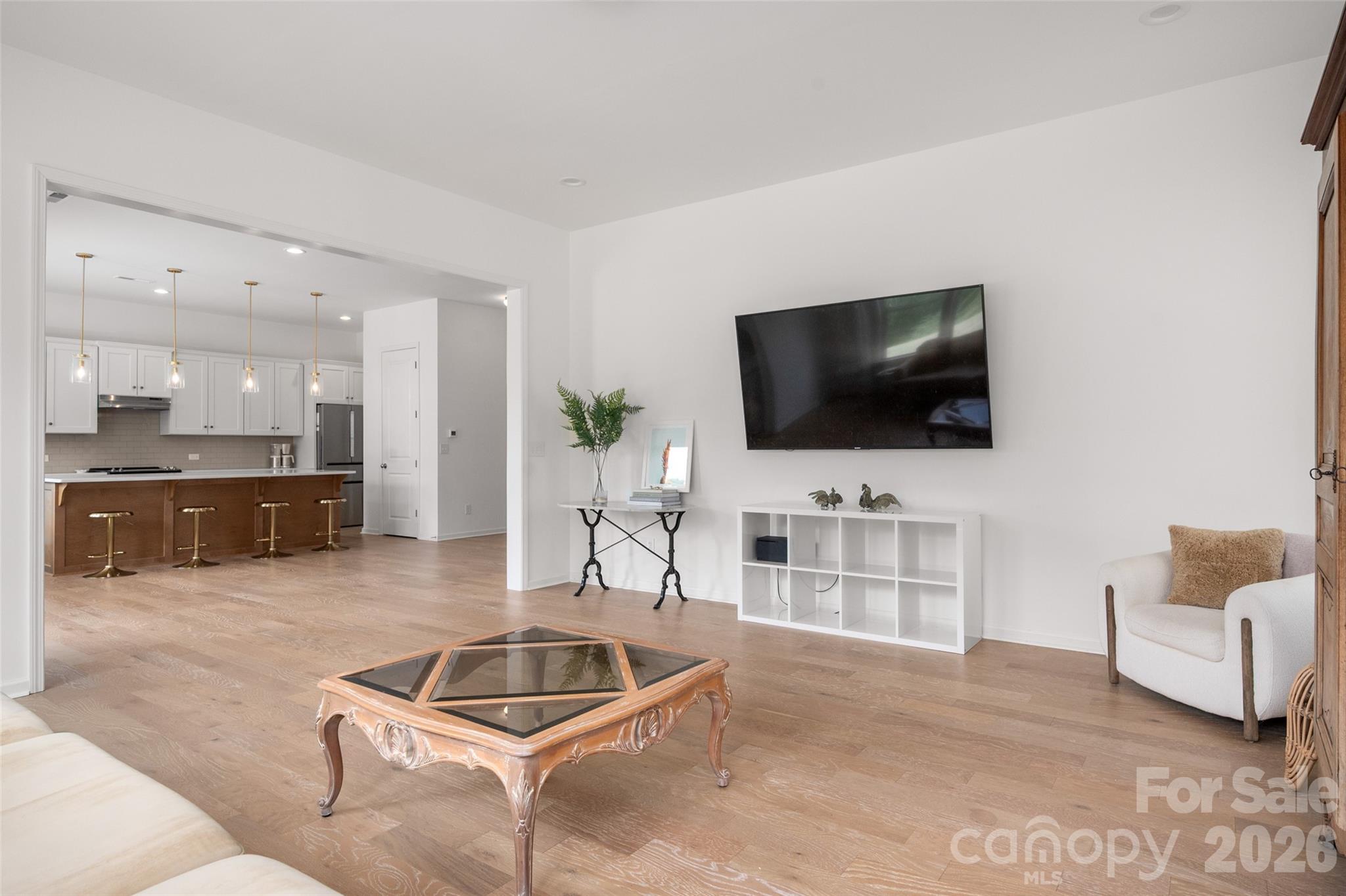 Great room into kitchen - 1042 Scotch Meadows Loop, Monroe