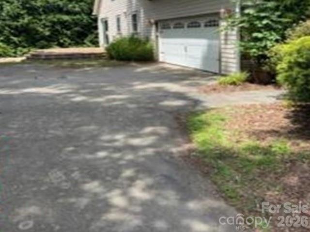 Single Family Residence at 4 Sterling Oaks Drive, Fletcher, photo 2 of 9