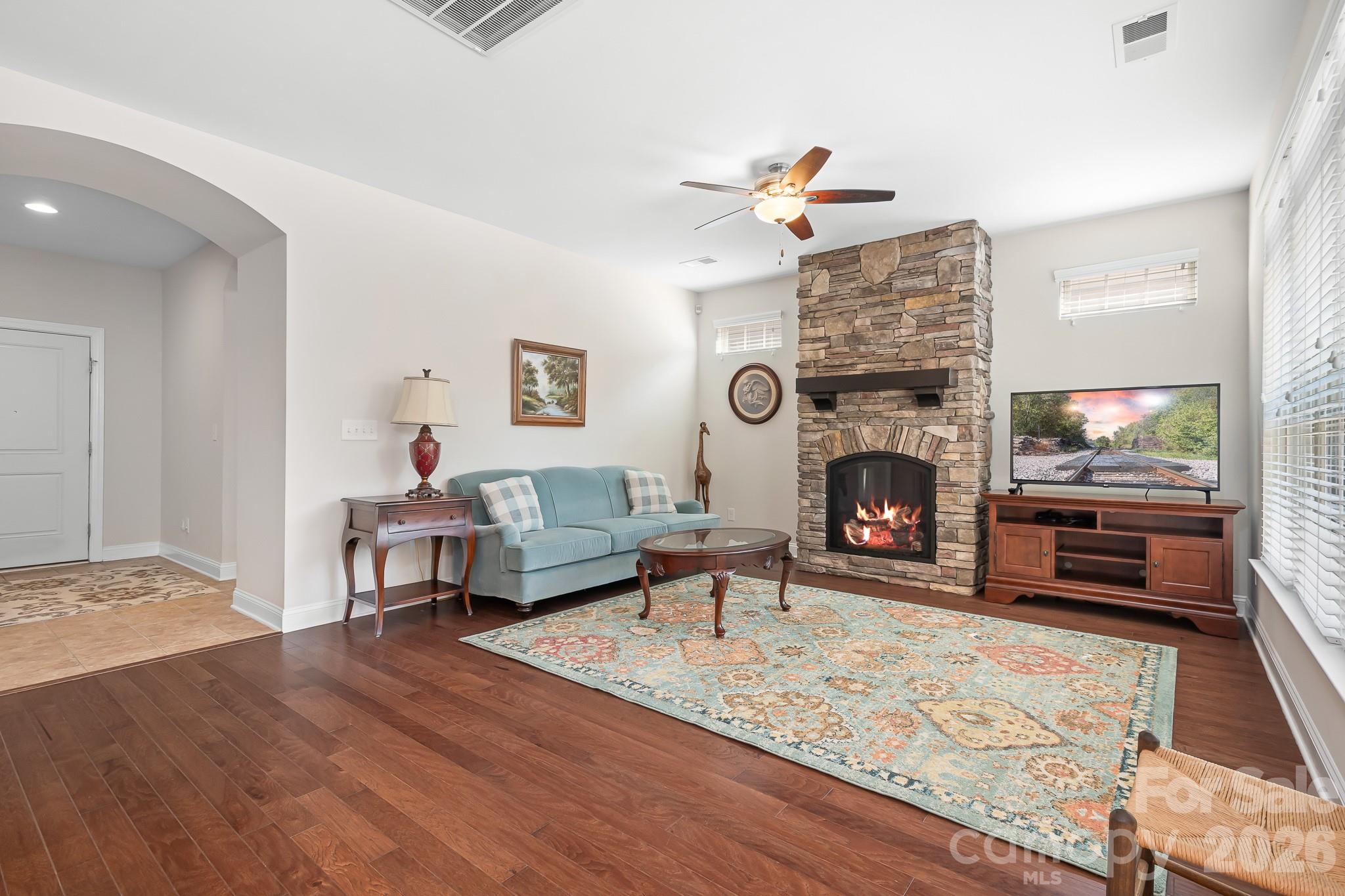 Family Rm with Stone surround Fireplace. - 127 Brawley Point Circle, Mooresville