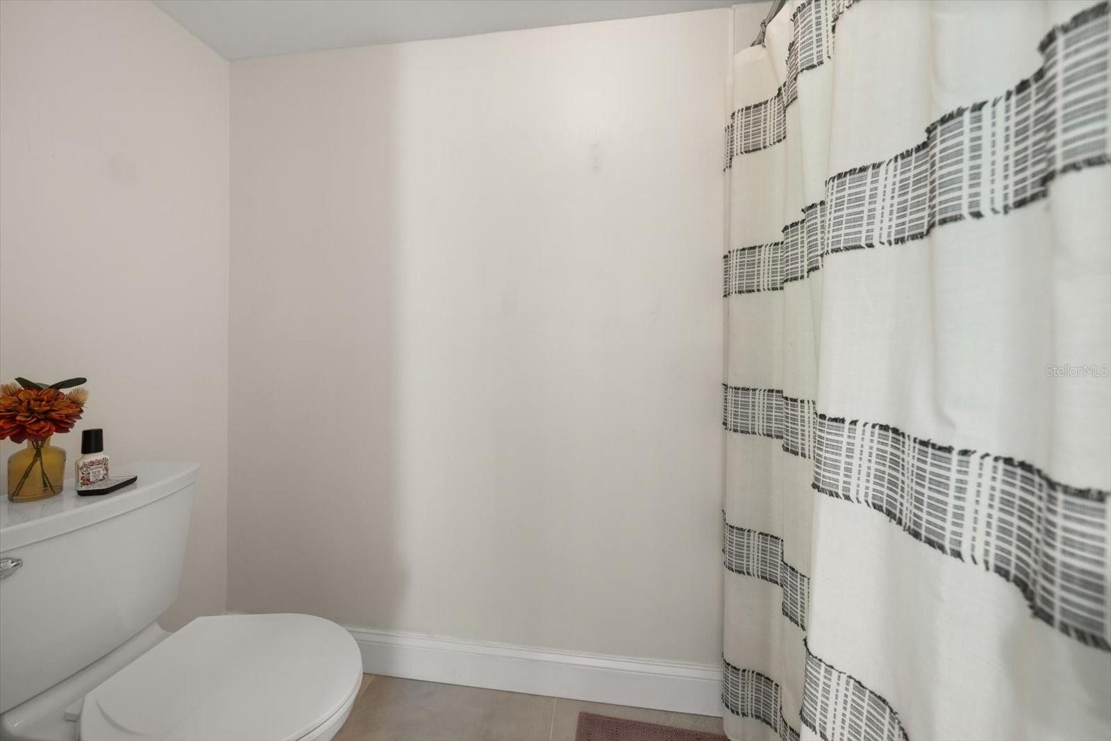 primary shower - 2614 COVE CAY DR #409, CLEARWATER