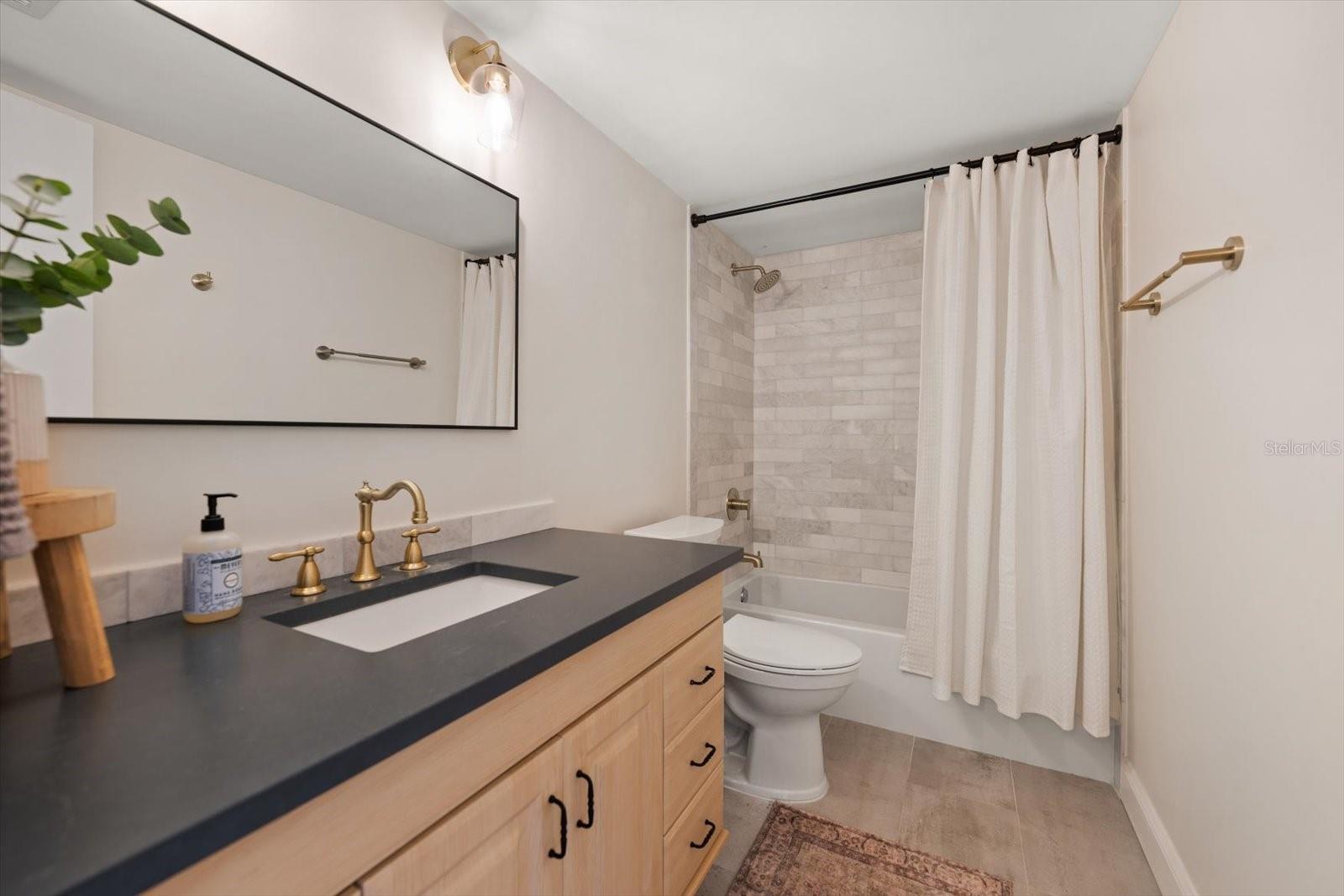 2nd bathroom - 2614 COVE CAY DR #409, CLEARWATER