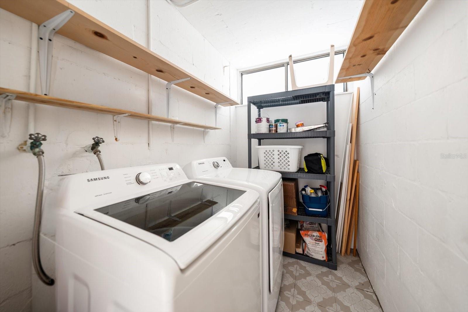 private laundry room and storage - 2614 COVE CAY DR #409, CLEARWATER