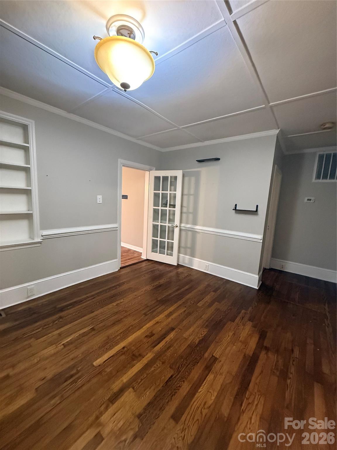 Dining Room with built in and crown molding - 4220 Harvard Avenue, Greensboro