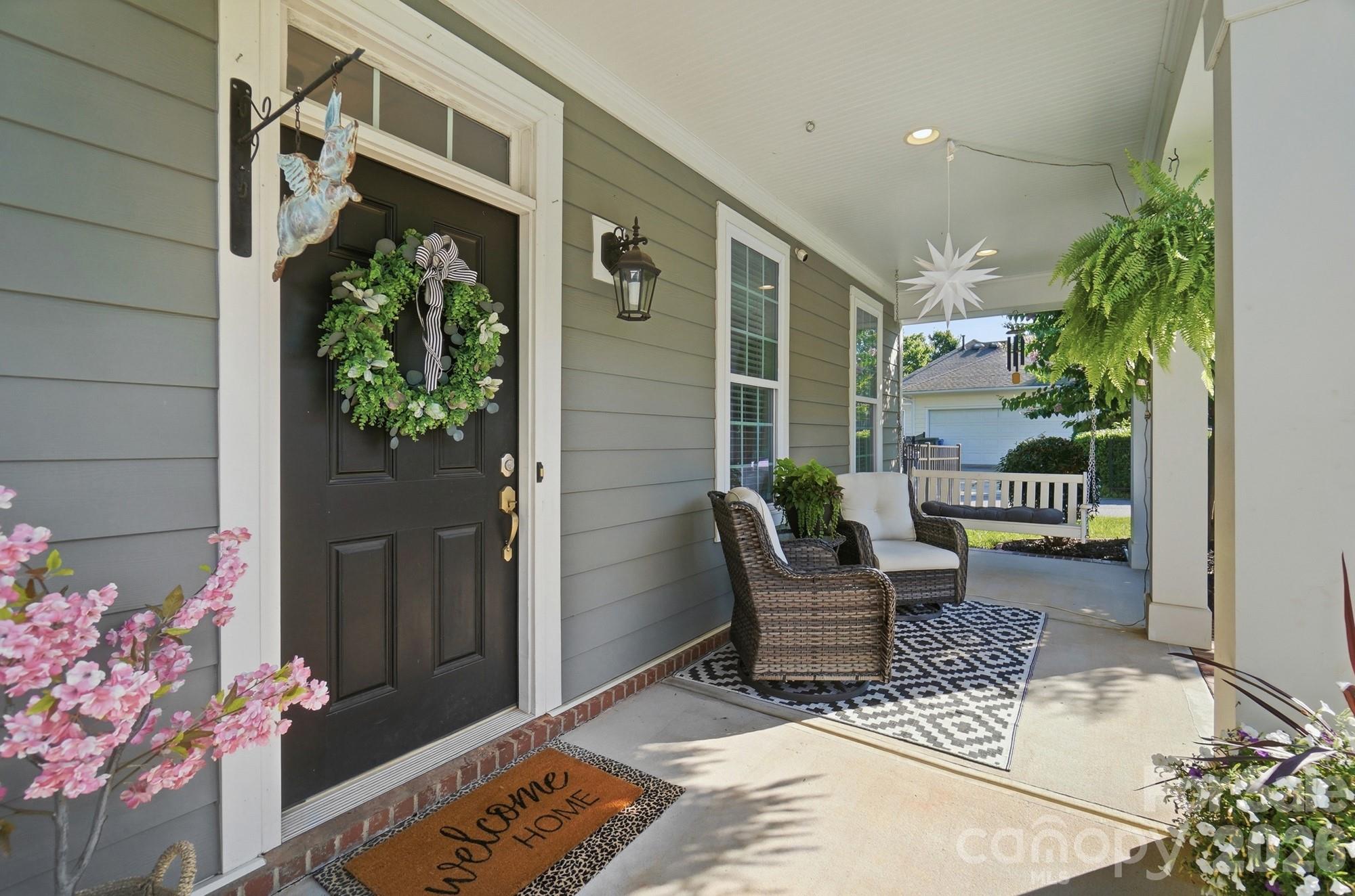 The perfect place to wave to neighbors and wind down the day! - 6217 Hove Road, Mint Hill