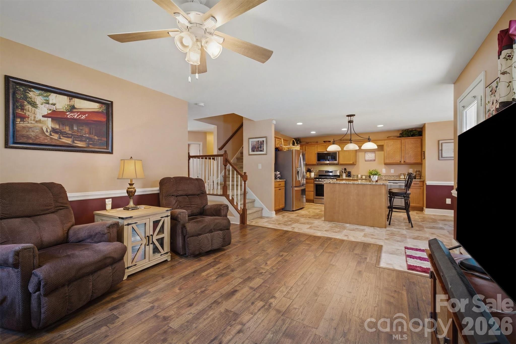 Open living room withview of kitchen - 802 White Oaks Circle, Monroe