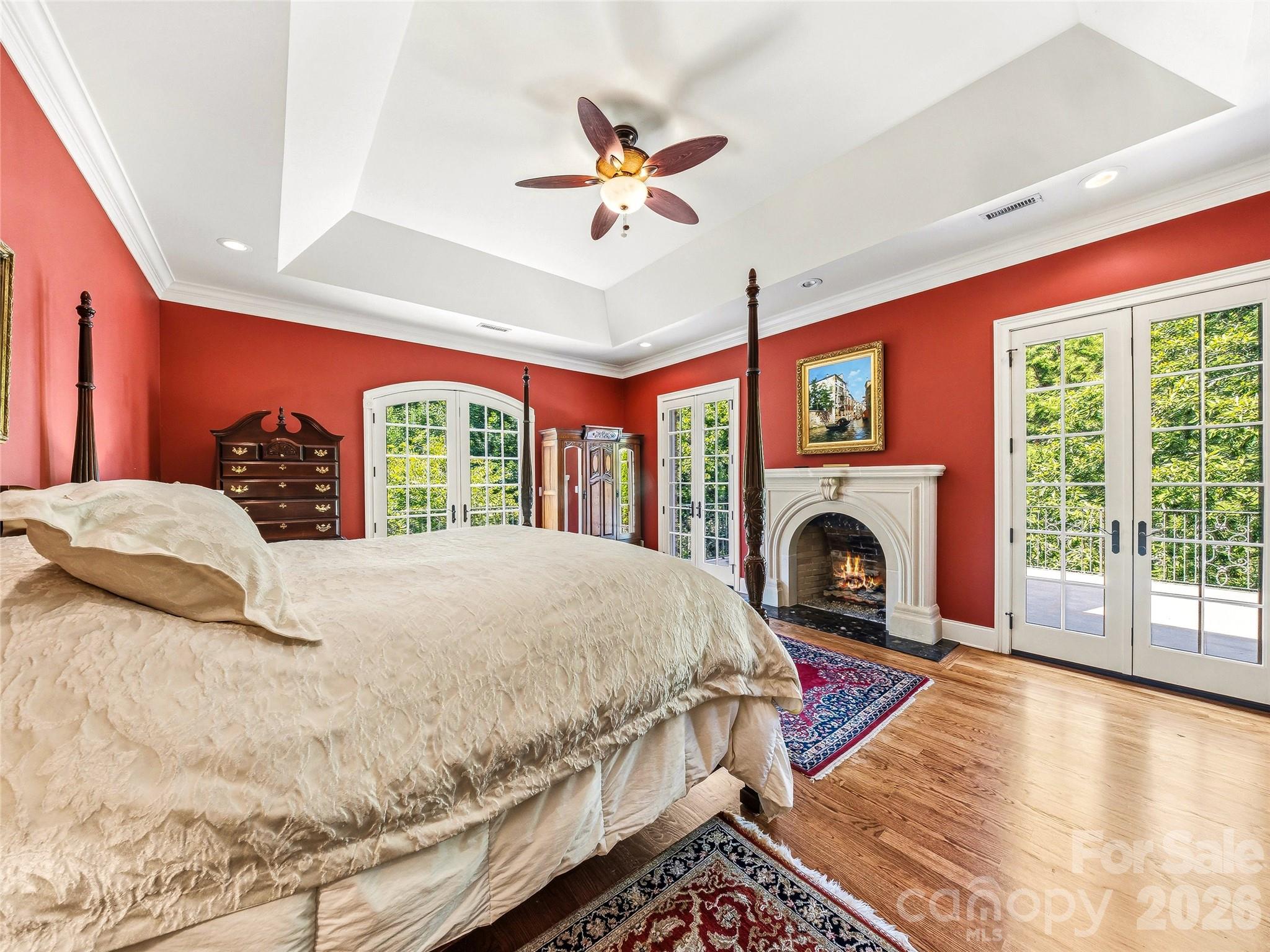 Primary Suite Private balcony. Fireplace. Ten acres of treetops. This is the room you've earned. - 150 Rainbow View Drive, Fletcher