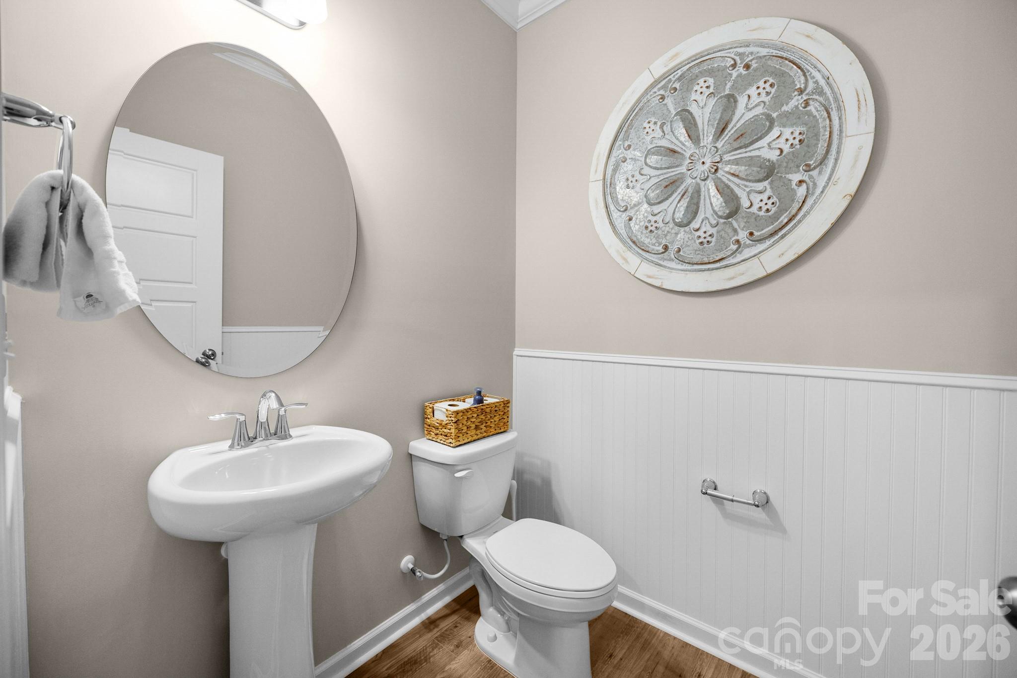 Half bath conveniently located by the garage entry, away from the main living areas for privacy - 5080 Mooreland Oaks Way, Mount Holly