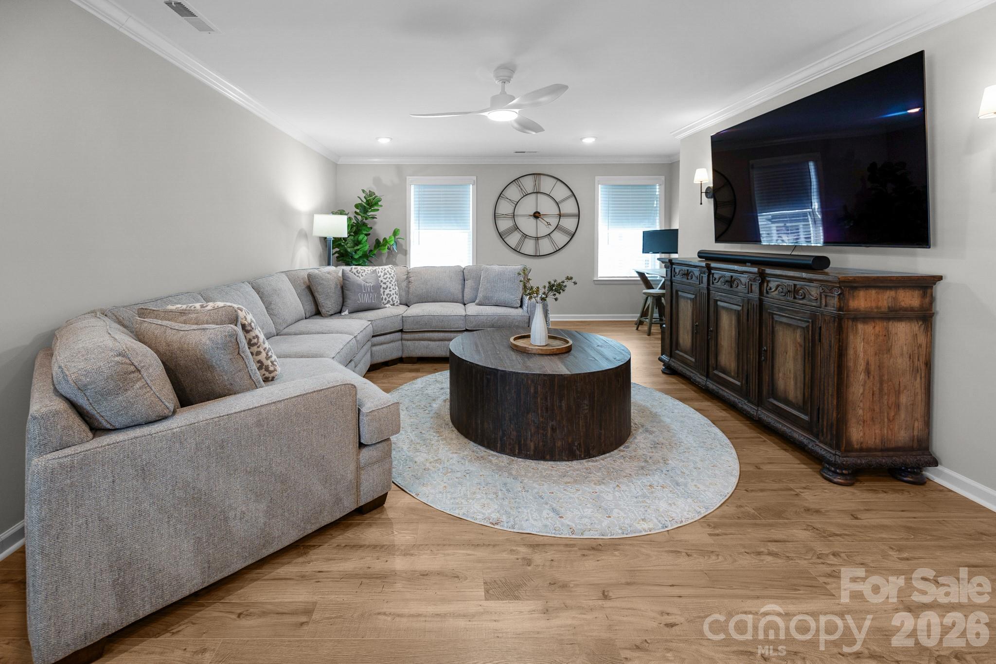 Up the stairs and to the right, you will find this spacious bonus room that splits up the floor plan thoughtfully from the other two bedrooms for added privacy - 5080 Mooreland Oaks Way, Mount Holly