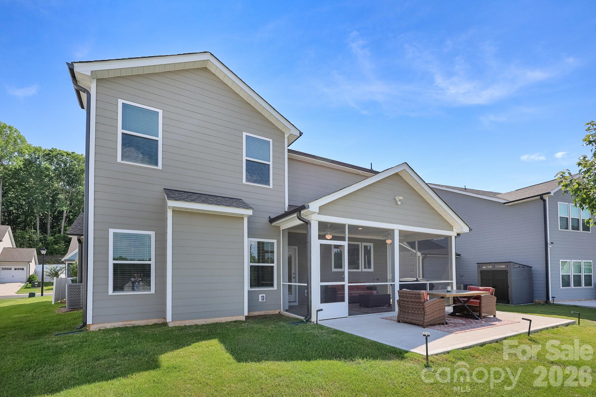 Extended patio for added enjoyment of the outdoors, giving you the option to be covered on hot sunny days or out in the open air on cooler climate days/evenings - perfect for grilling out! - 5080 Mooreland Oaks Way, Mount Holly