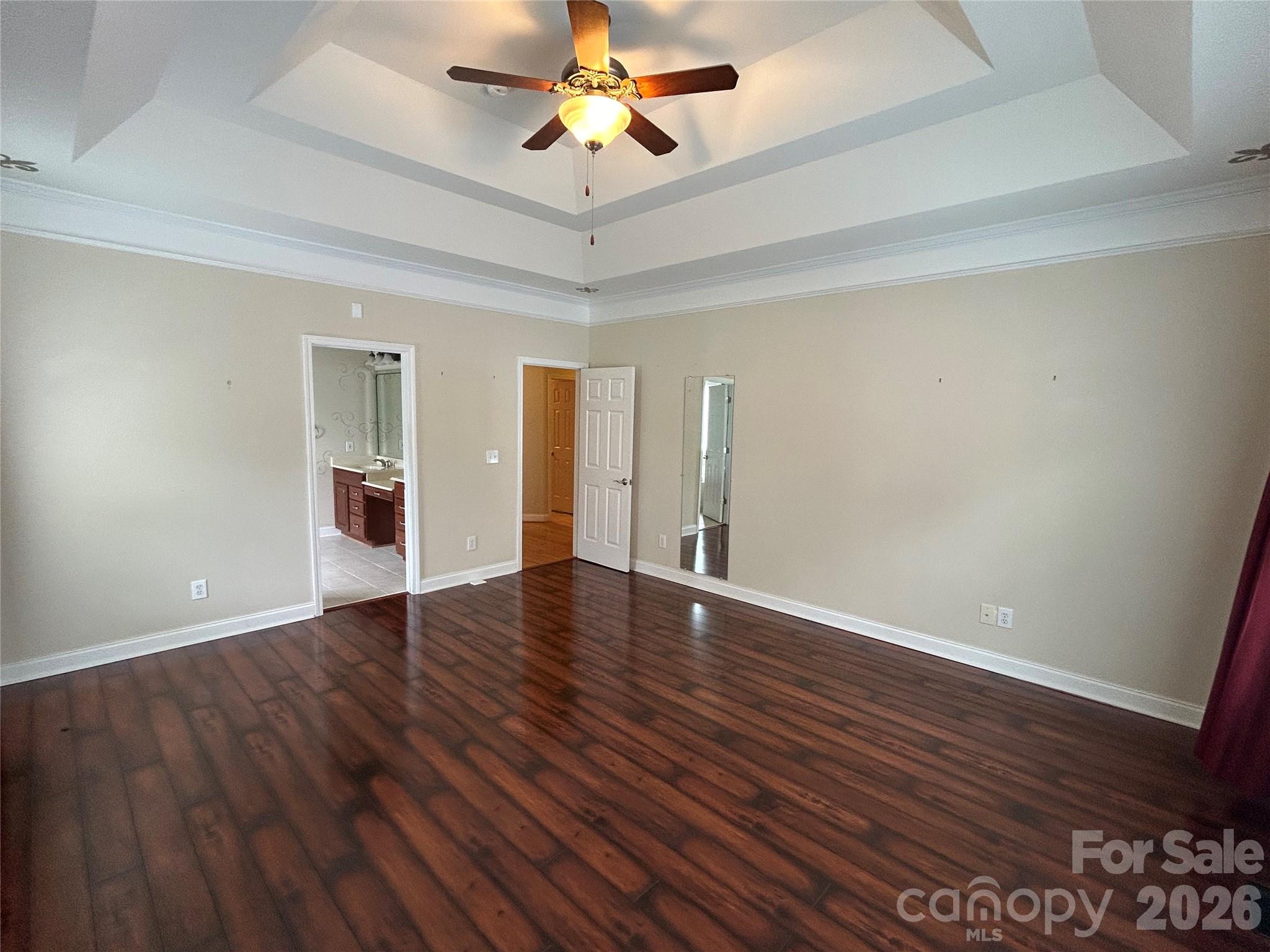 Primary Bedroom with tray ceiling. - 3968 Troon Drive SW, Concord
