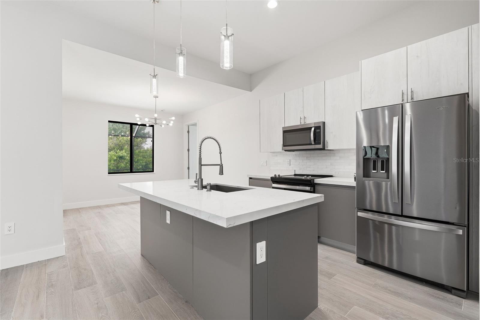 Kitchen Features Quartz Countertops and Stainless Steel Appliances - 14319 ALLENSWORTH AVE, PORT CHARLOTTE