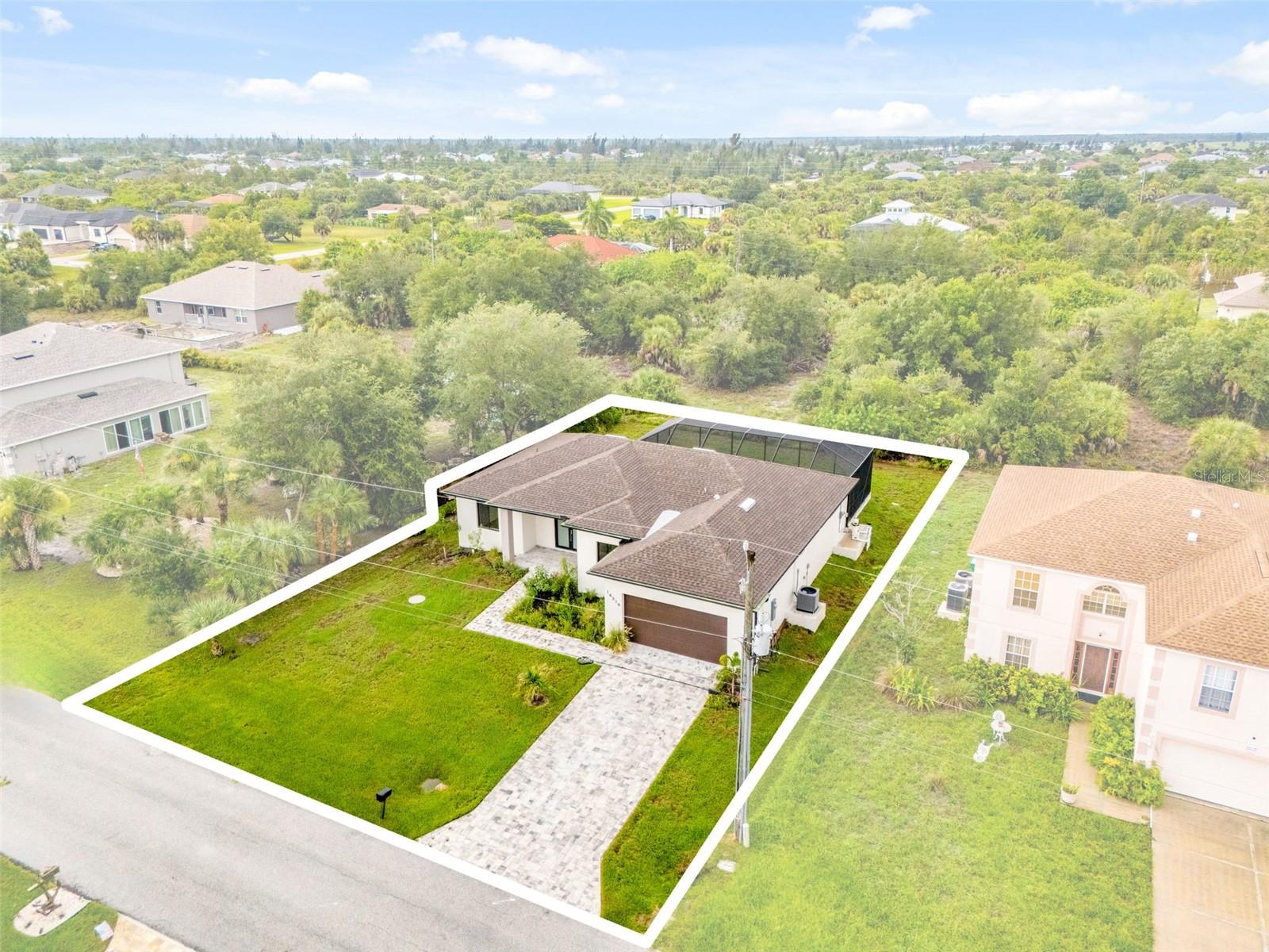 Green Belt Surrounds Home with Paver Driveway - 14319 ALLENSWORTH AVE, PORT CHARLOTTE