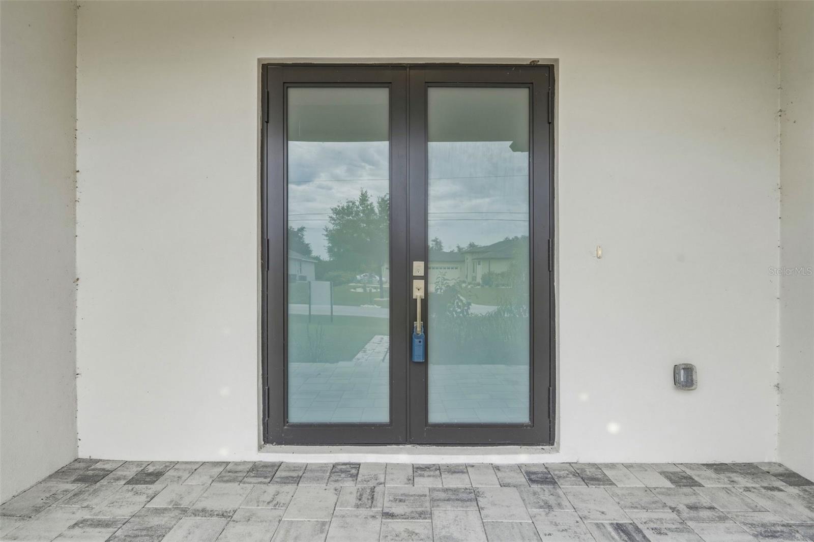 Covered Front Entry with Paver Walkway and Elegant Design - 14319 ALLENSWORTH AVE, PORT CHARLOTTE