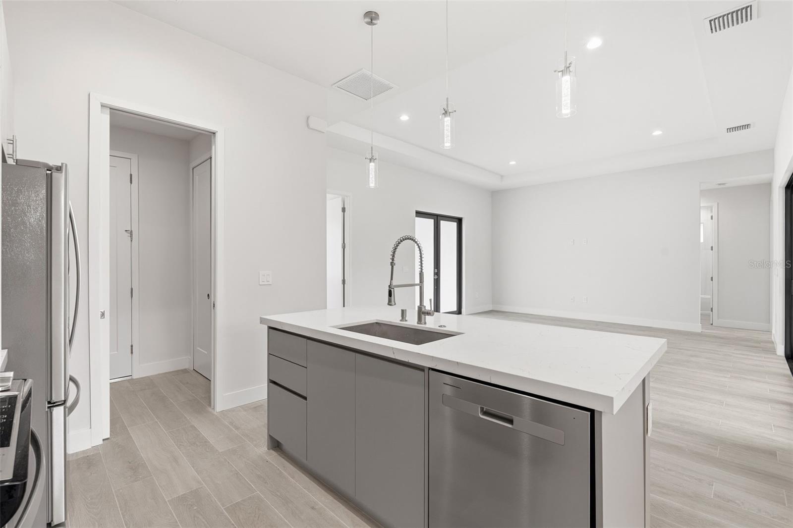 Kitchen Features Breakfast Bar and Stainless Appliances - 14319 ALLENSWORTH AVE, PORT CHARLOTTE