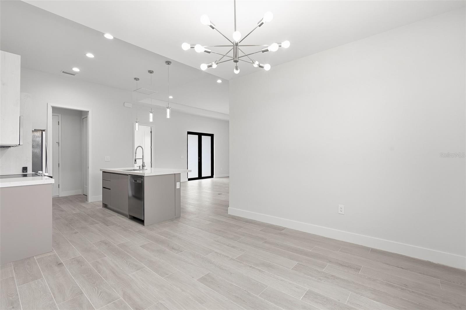 Open Concept Dining Area into Kitchen - 14319 ALLENSWORTH AVE, PORT CHARLOTTE