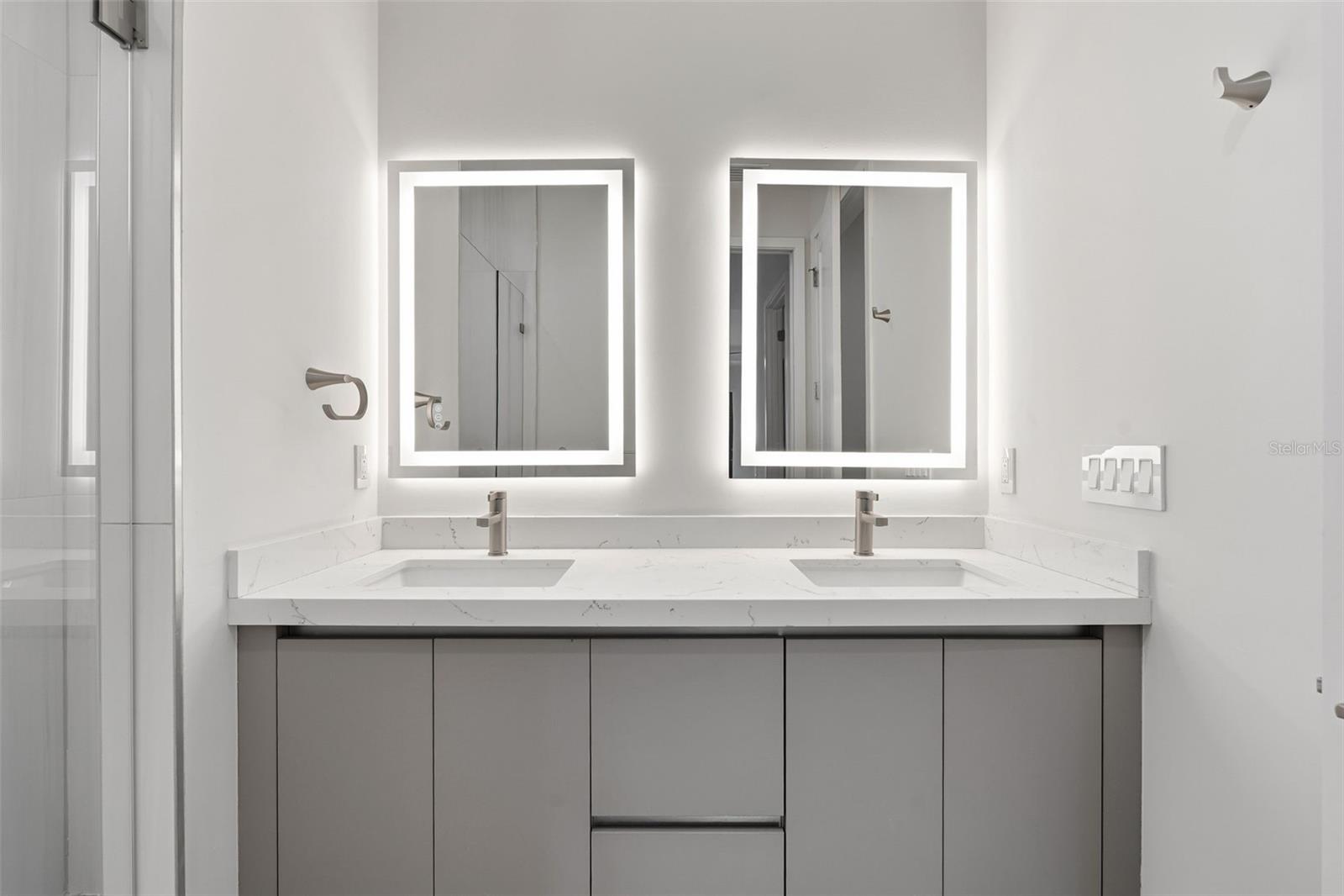Primary Bathroom with Dual Vanity, LED Mirrors and Walk-In Glass Shower - 14319 ALLENSWORTH AVE, PORT CHARLOTTE