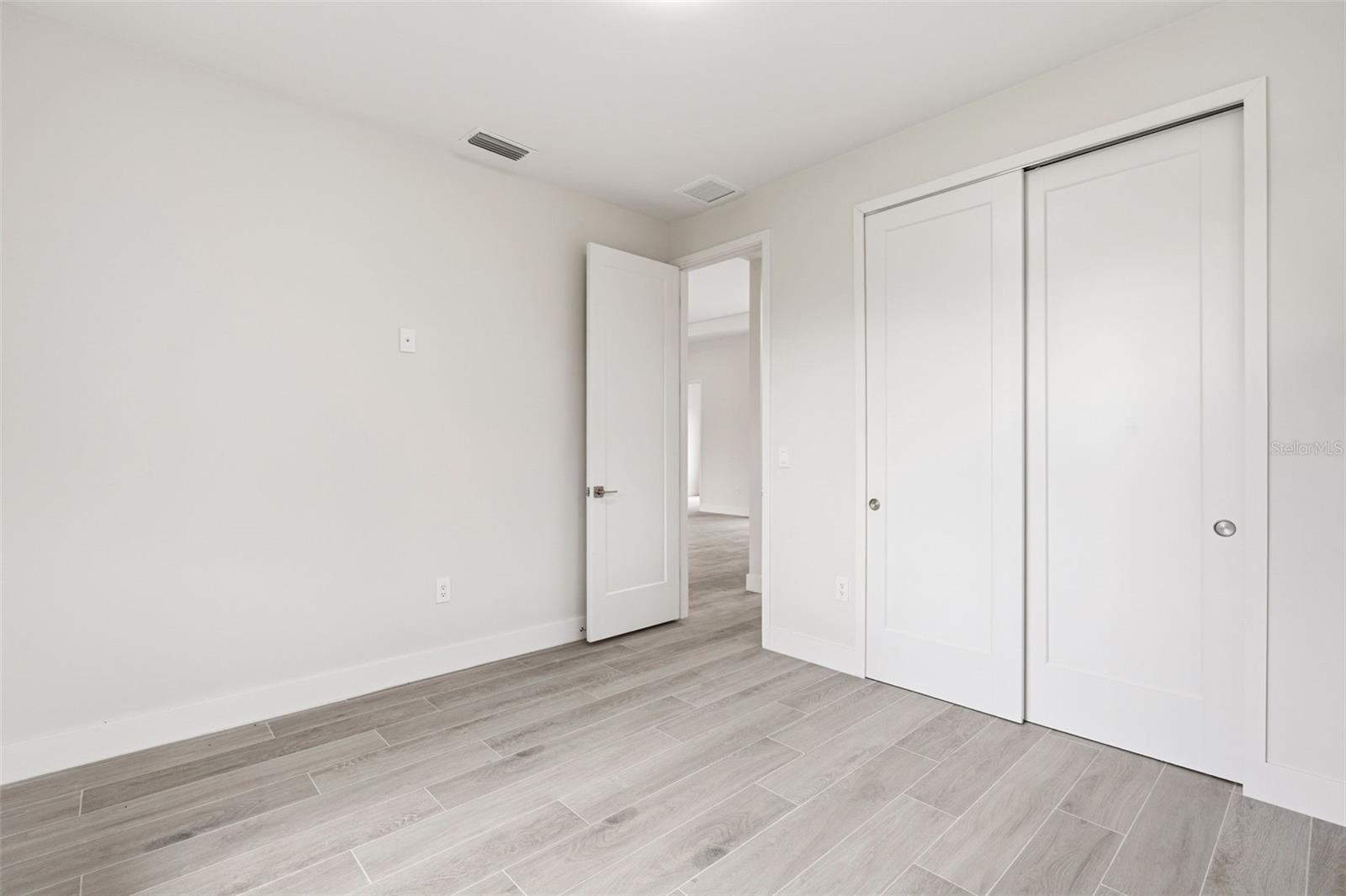 Bedroom 3 Features Porcelain Plank Tile Flooring - 14319 ALLENSWORTH AVE, PORT CHARLOTTE
