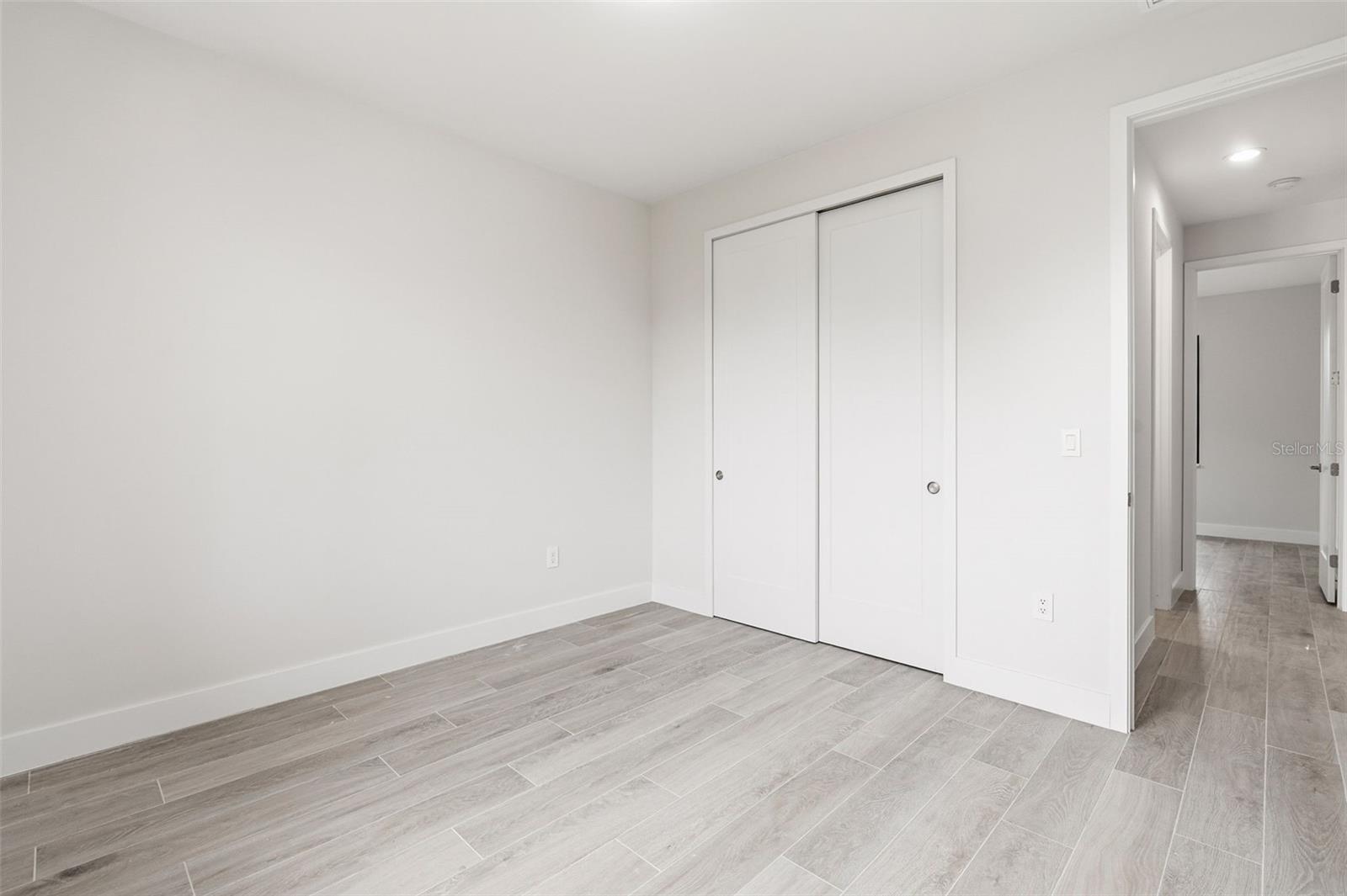 Bedroom 4 Features Natural Light & Porcelain Plank Tile Flooring - 14319 ALLENSWORTH AVE, PORT CHARLOTTE